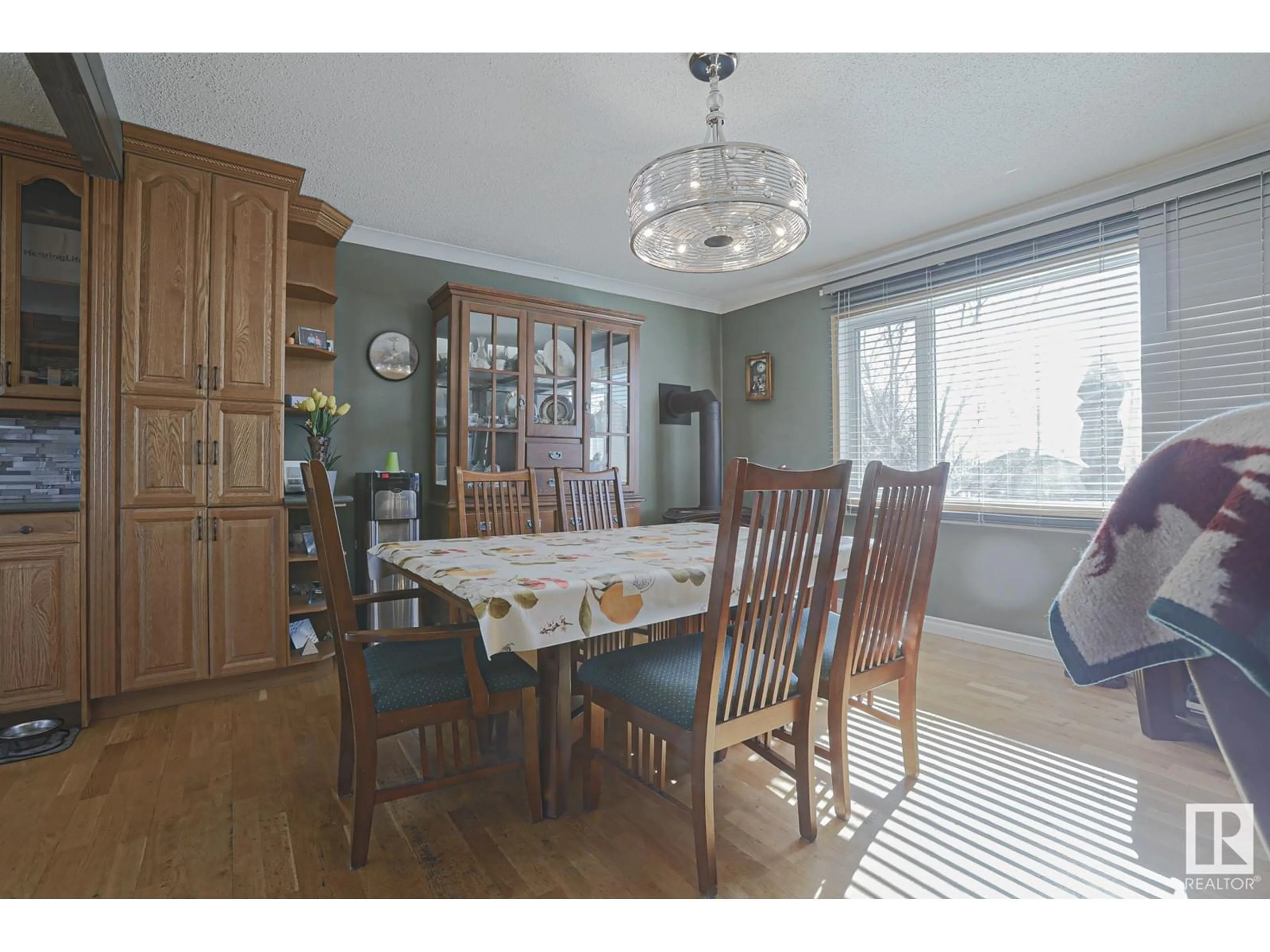 Dining room, wood/laminate floor for 5018 50 ST, Rural Thorhild County Alberta T0A2R0