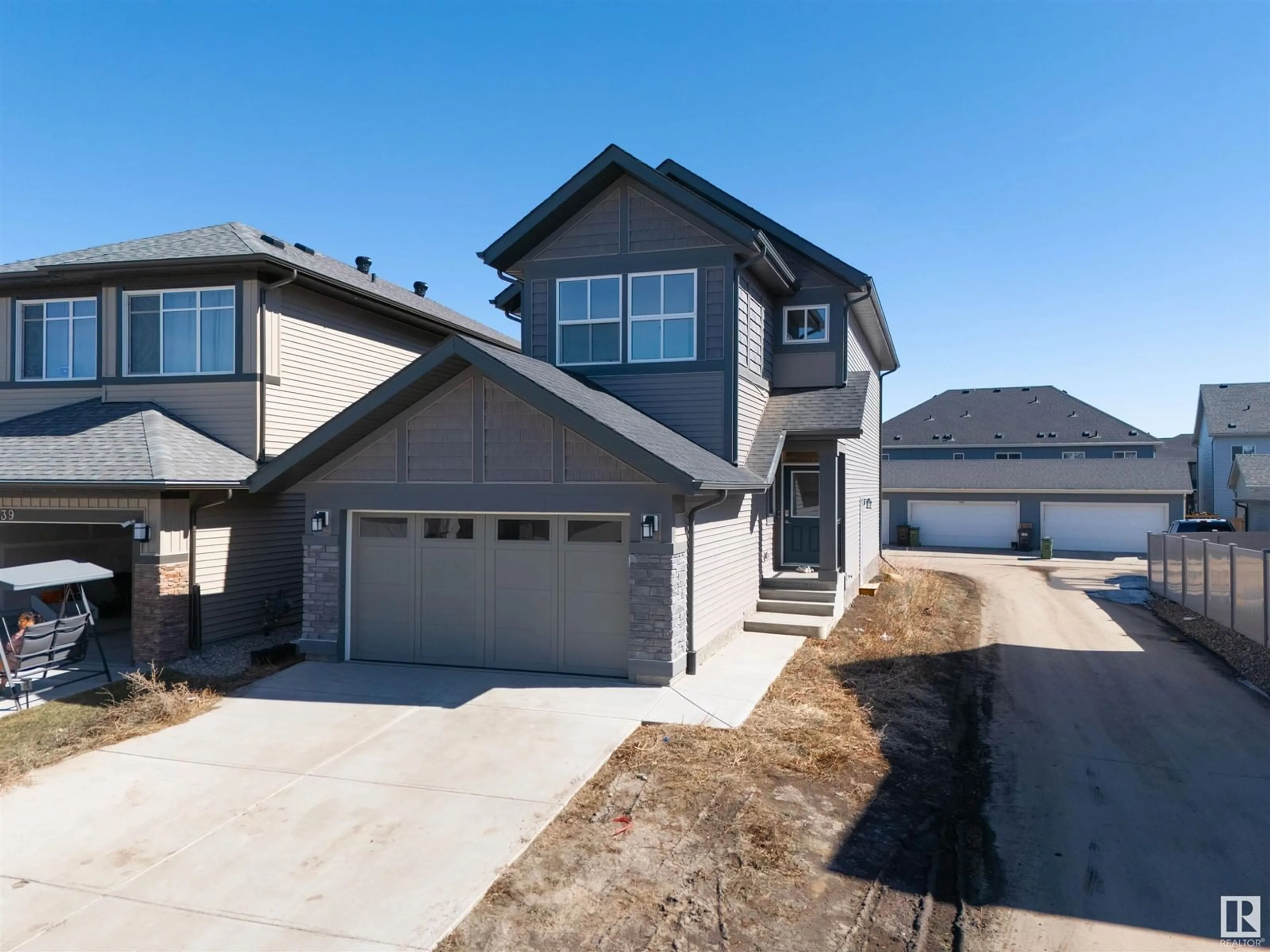 Home with vinyl exterior material, street for NW - 9335 226 ST, Edmonton Alberta T5T7R5