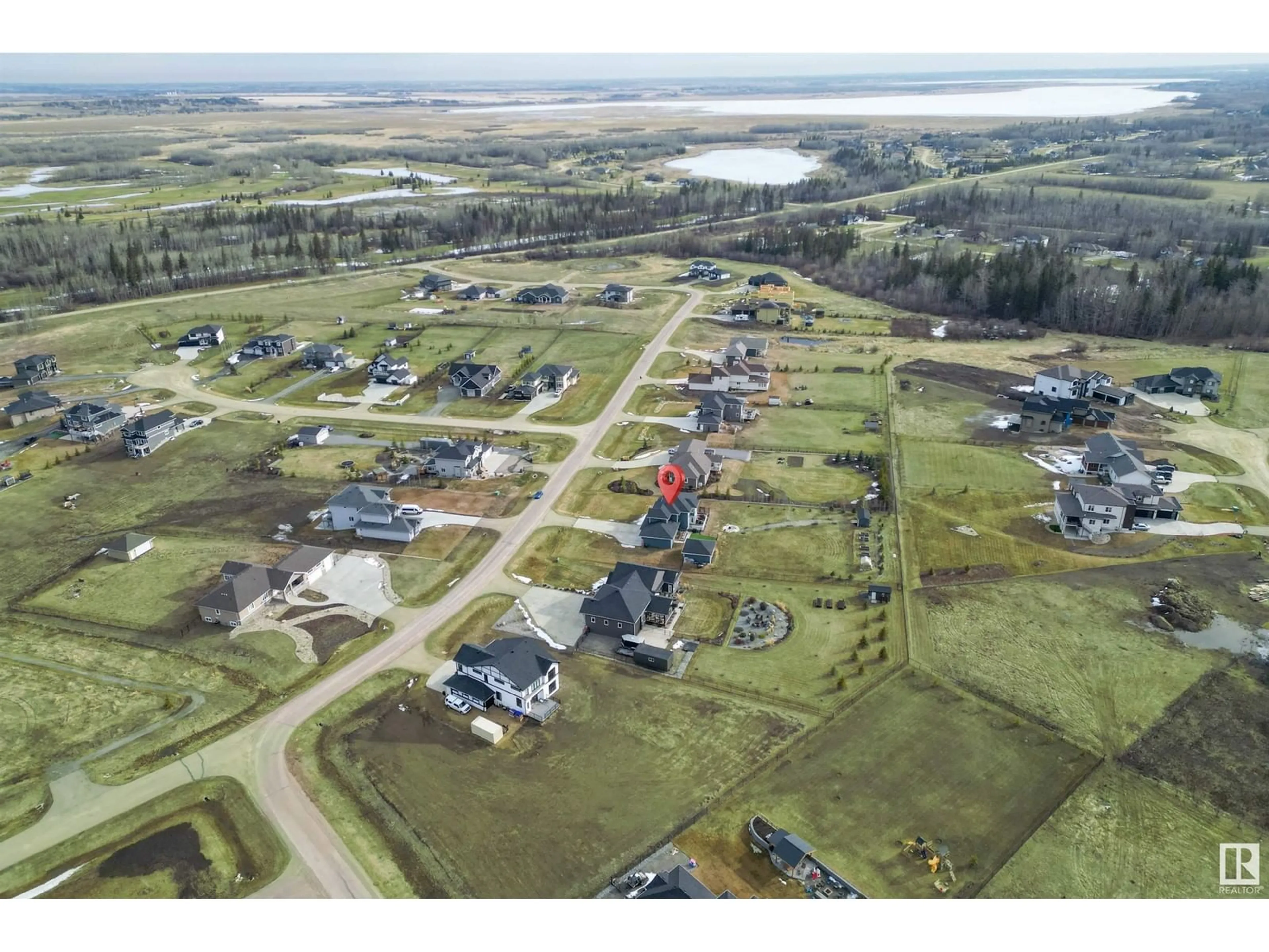 A pic from outside/outdoor area/front of a property/back of a property/a pic from drone, water/lake/river/ocean view for 26409 - 39 TWP ROAD 532 A, Rural Parkland County Alberta T7X0W7