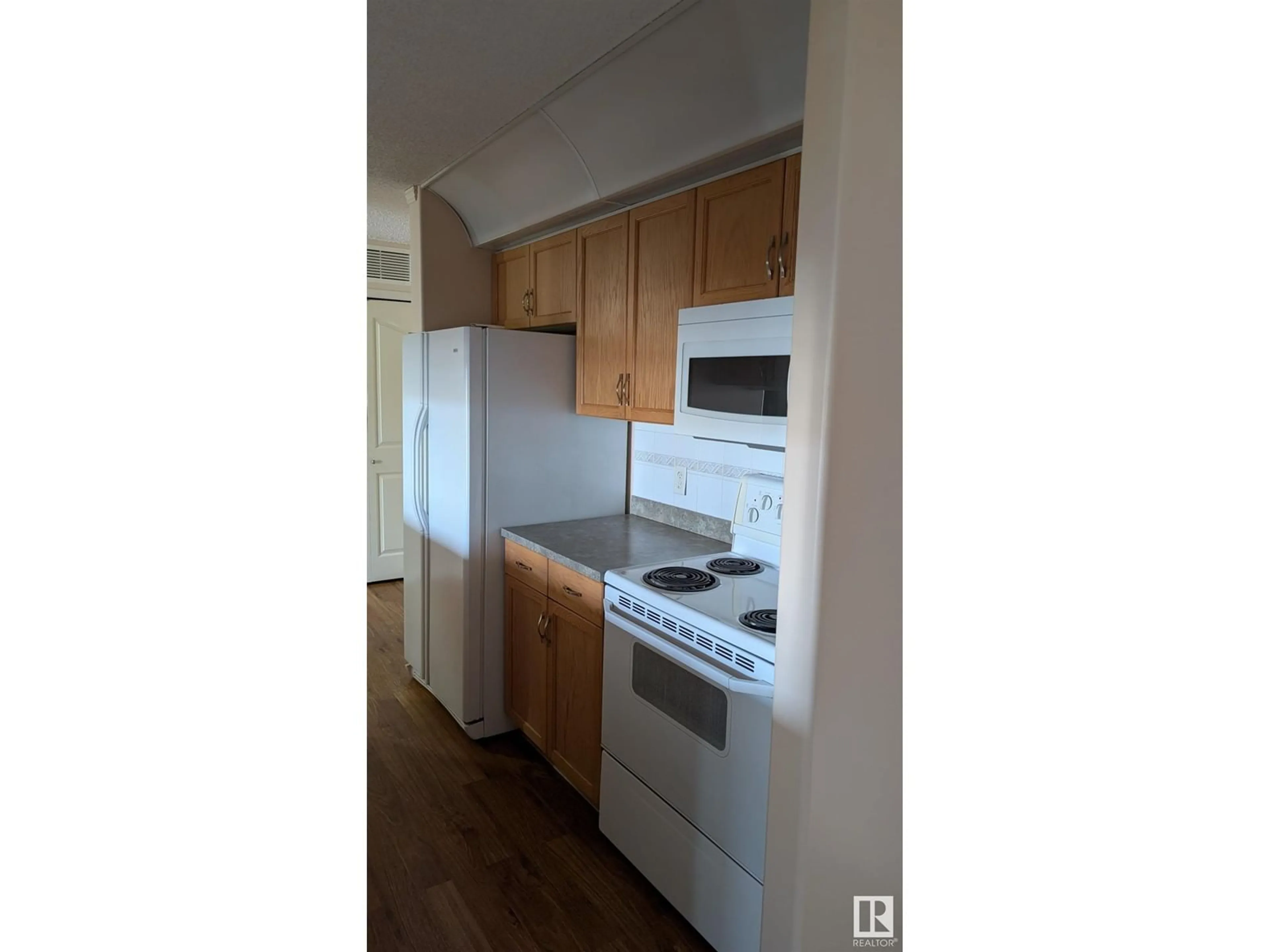 Standard kitchen, wood/laminate floor for #403 - 16303 95 ST, Edmonton Alberta T5Z3V1