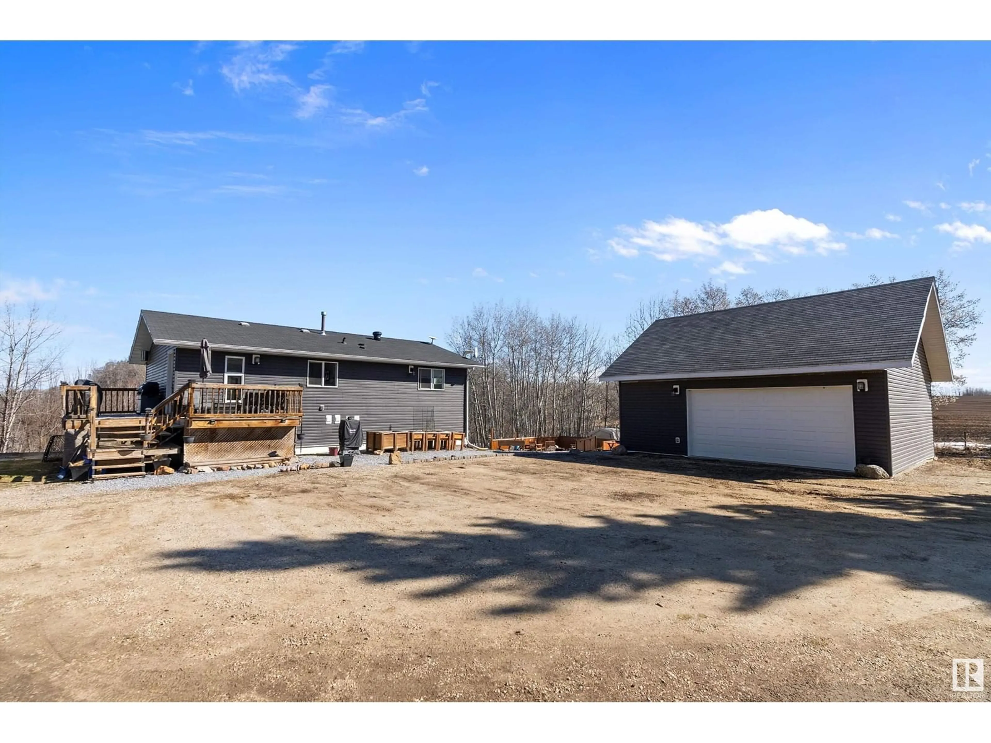 A pic from outside/outdoor area/front of a property/back of a property/a pic from drone, building for 53025 - 44 HGHWAY, Rural Parkland County Alberta T7Y2J5