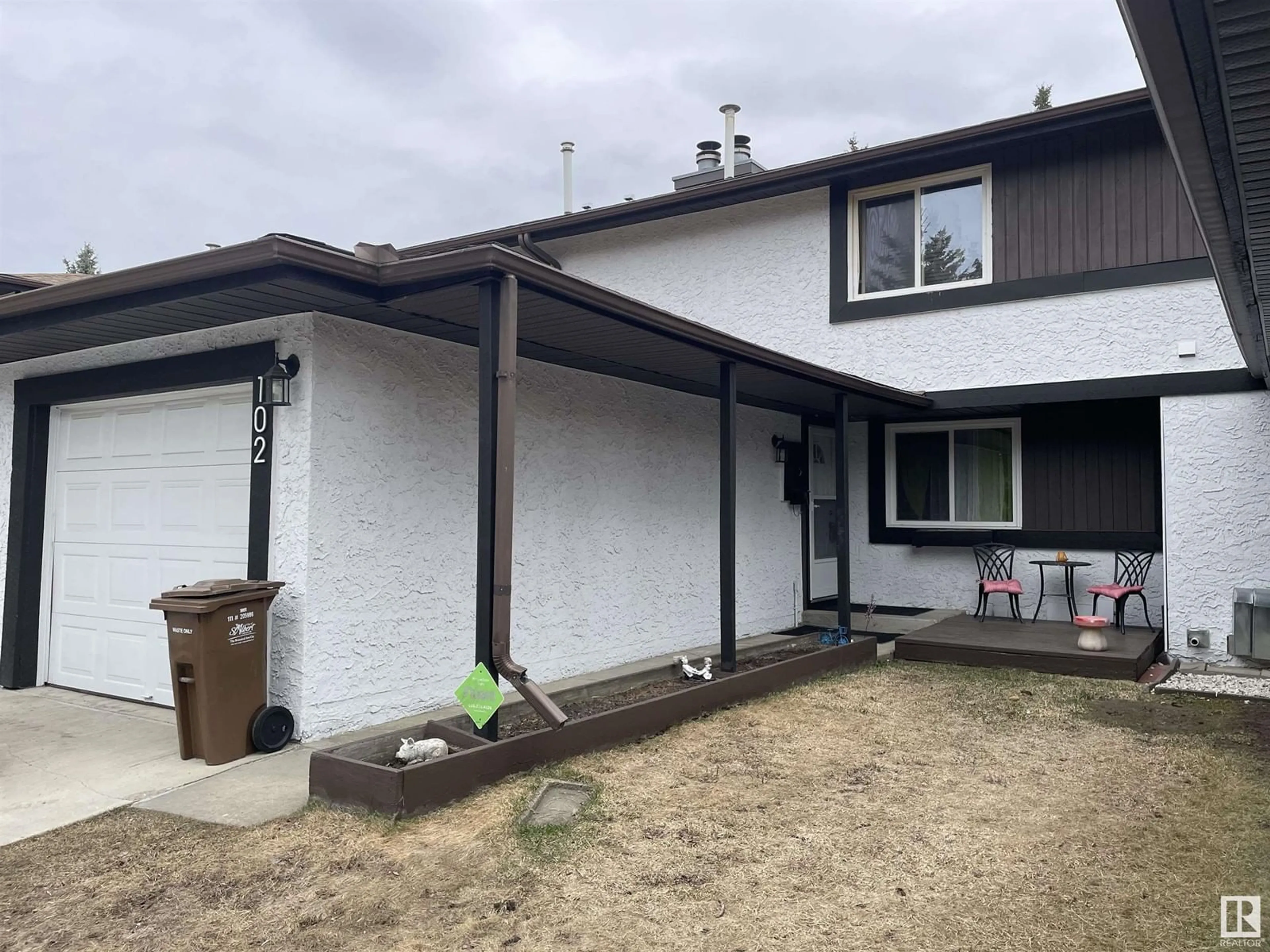 Home with vinyl exterior material, street for 102 FOREST GV, St. Albert Alberta T8N3K6