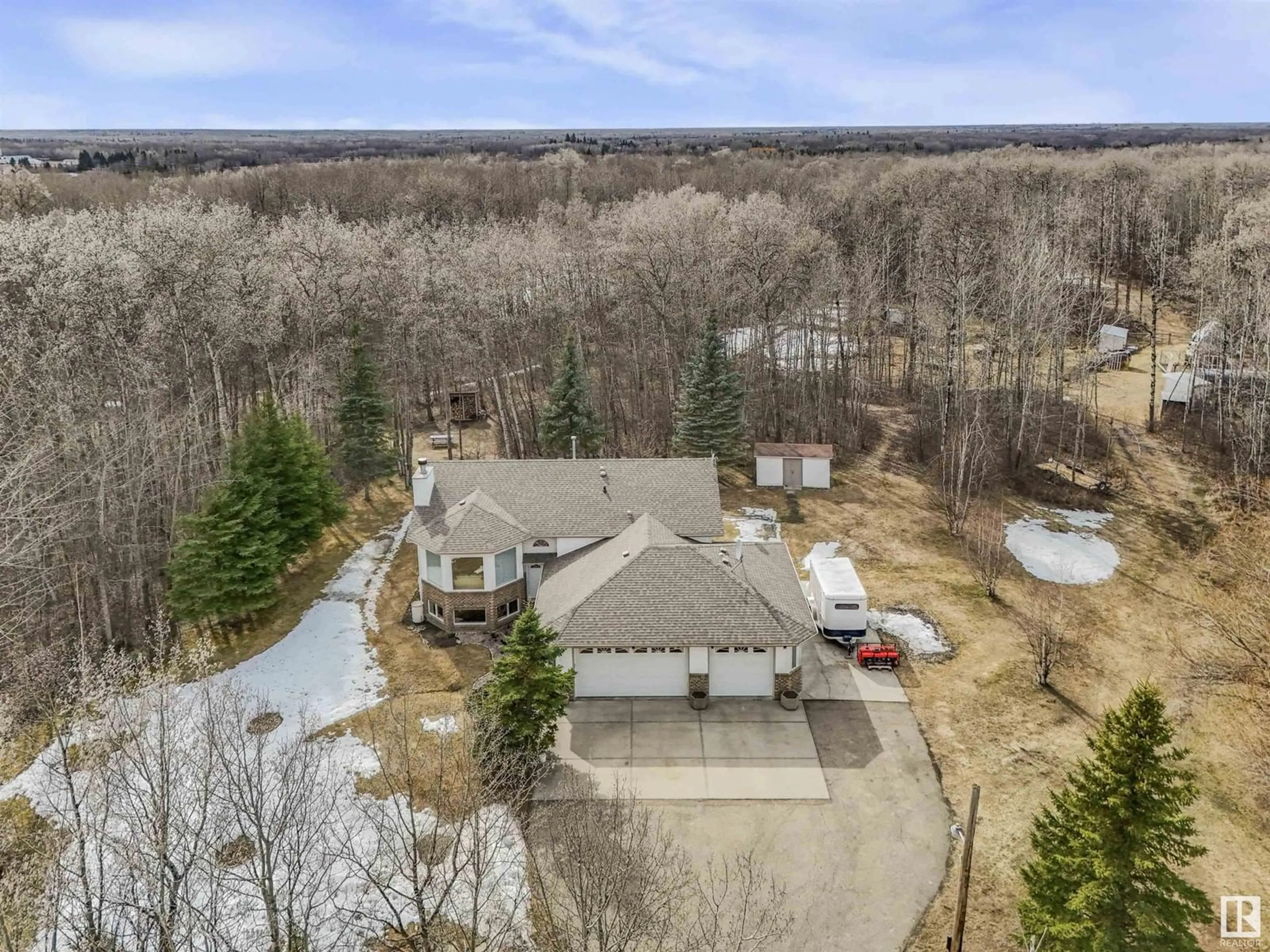 A pic from outside/outdoor area/front of a property/back of a property/a pic from drone, water/lake/river/ocean view for 52420 RGE ROAD 213, Rural Strathcona County Alberta T8G2E7