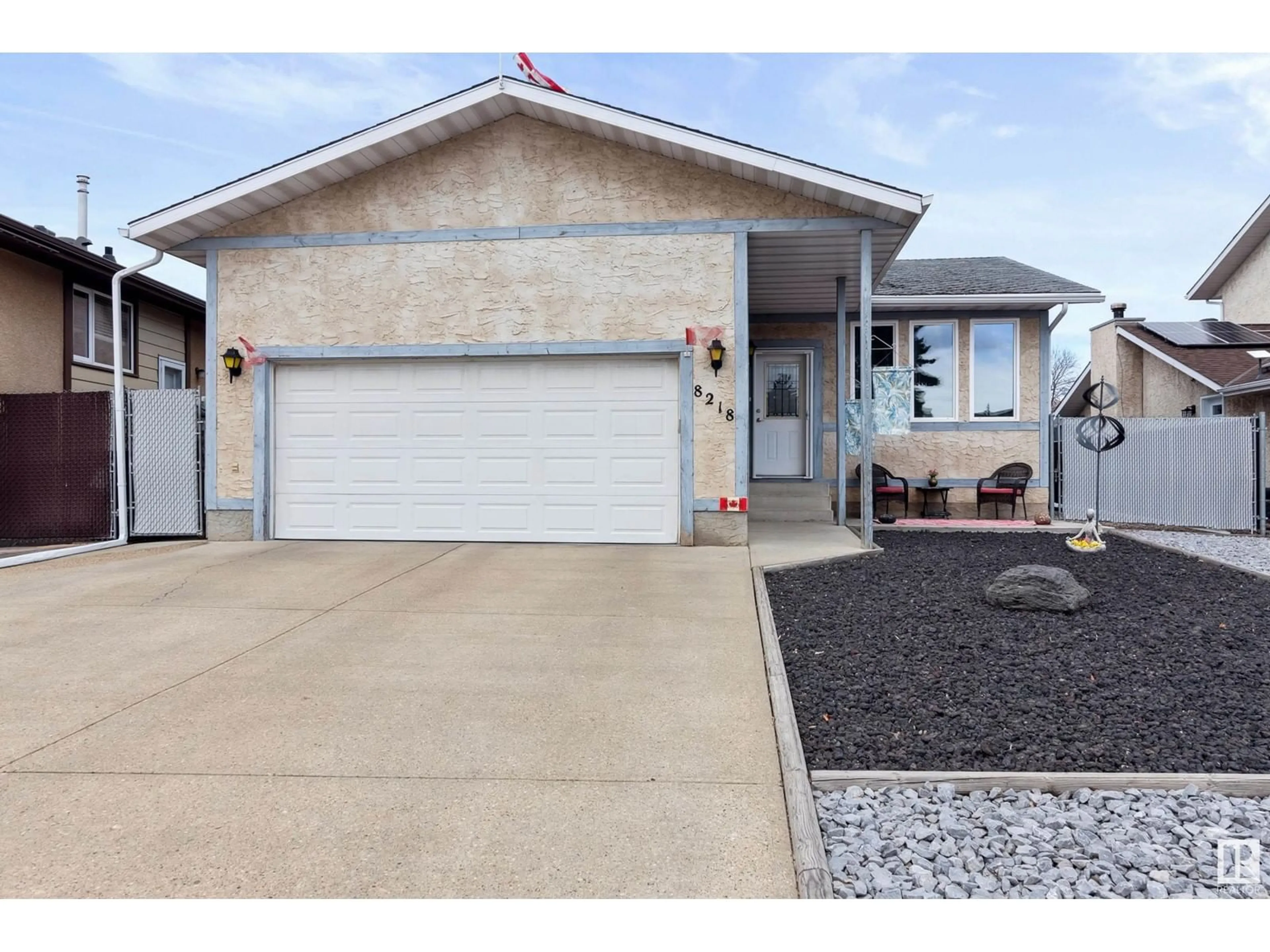 Home with vinyl exterior material, street for 8218 93 AV, Fort Saskatchewan Alberta T8L3P1