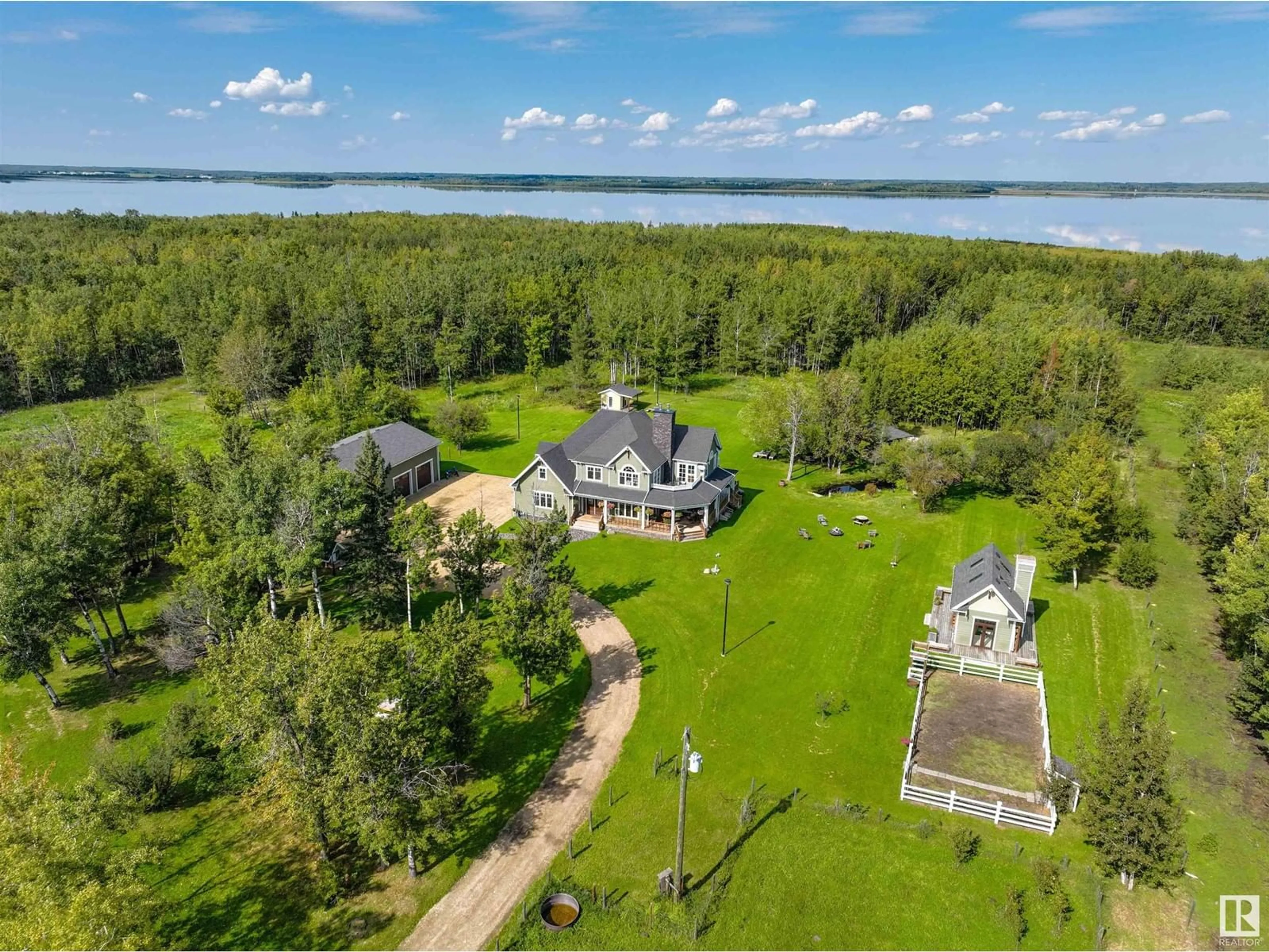 A pic from outside/outdoor area/front of a property/back of a property/a pic from drone, water/lake/river/ocean view for #37 - 51218 RGE RD 214, Rural Strathcona County Alberta T8E1G9