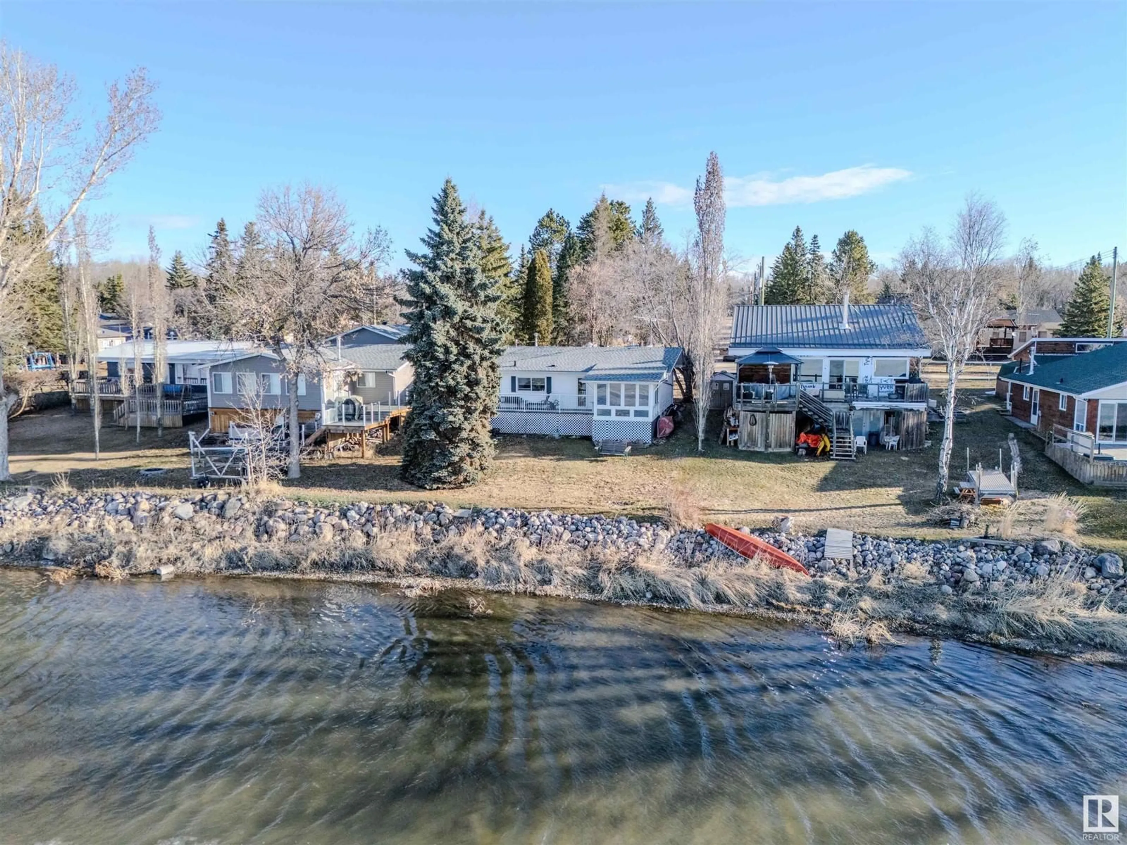 A pic from outside/outdoor area/front of a property/back of a property/a pic from drone, water/lake/river/ocean view for 316 3 STREET, Rural Lac Ste. Anne County Alberta T0E1A0