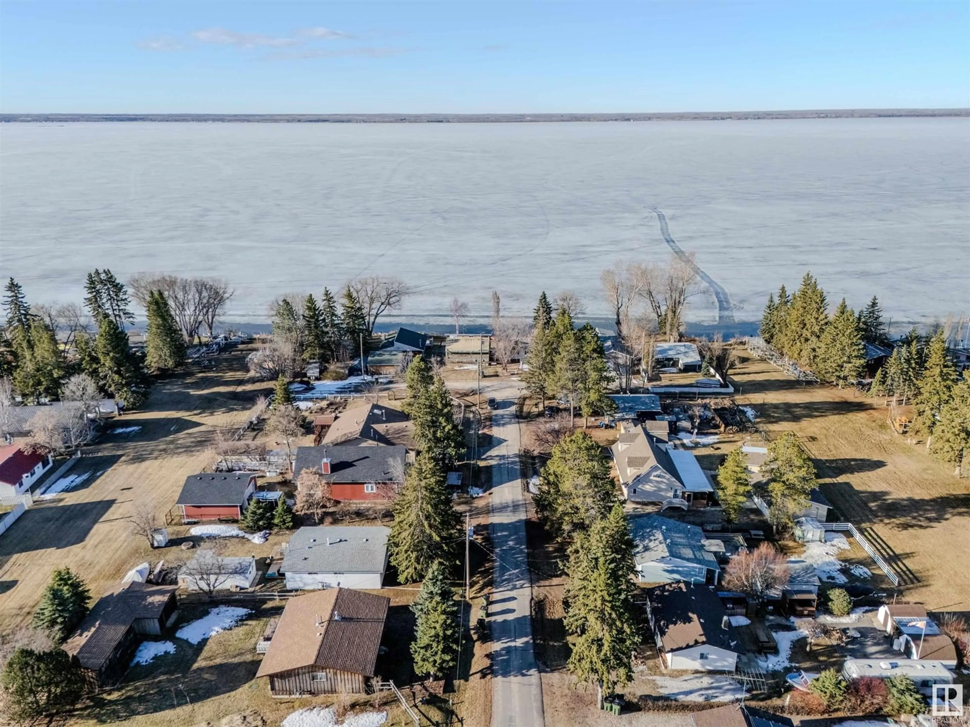 A pic from outside/outdoor area/front of a property/back of a property/a pic from drone, water/lake/river/ocean view for 316 3 STREET, Rural Lac Ste. Anne County Alberta T0E1A0