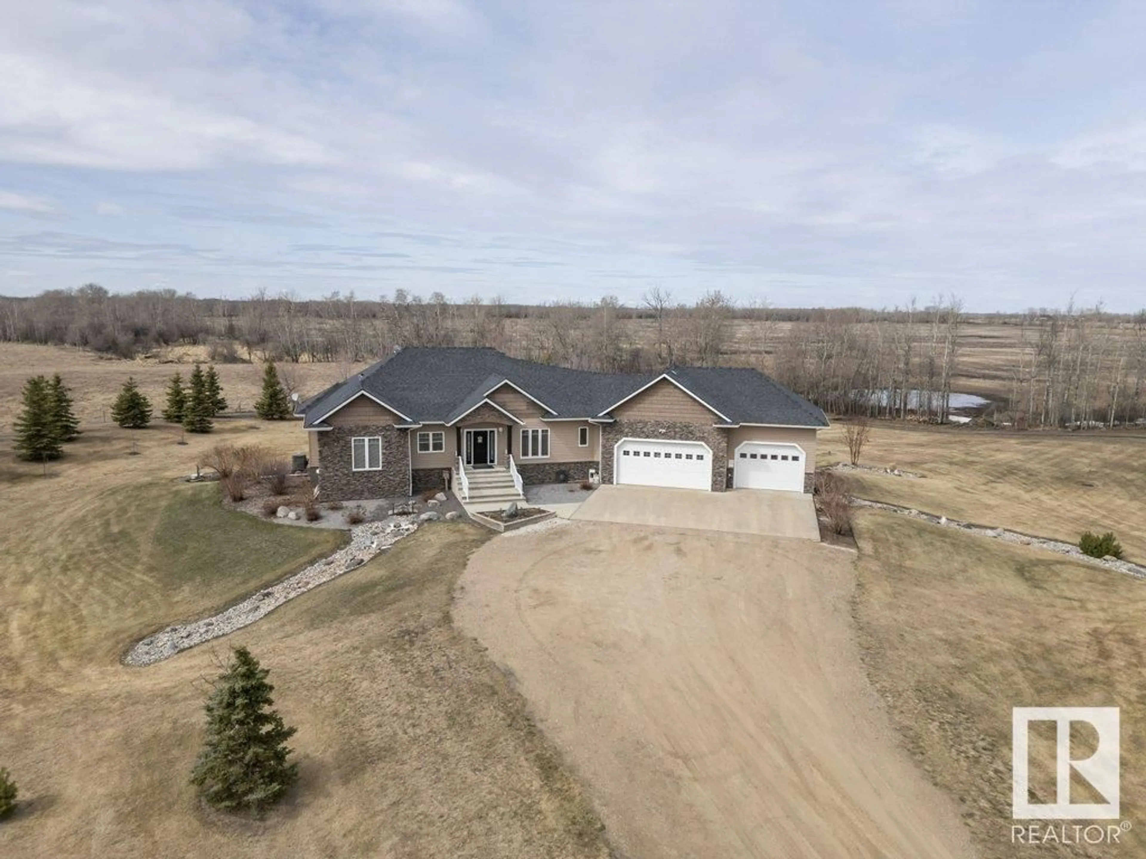 A pic from outside/outdoor area/front of a property/back of a property/a pic from drone, unknown for 58032 RR 210, Rural Thorhild County Alberta T0A2W0