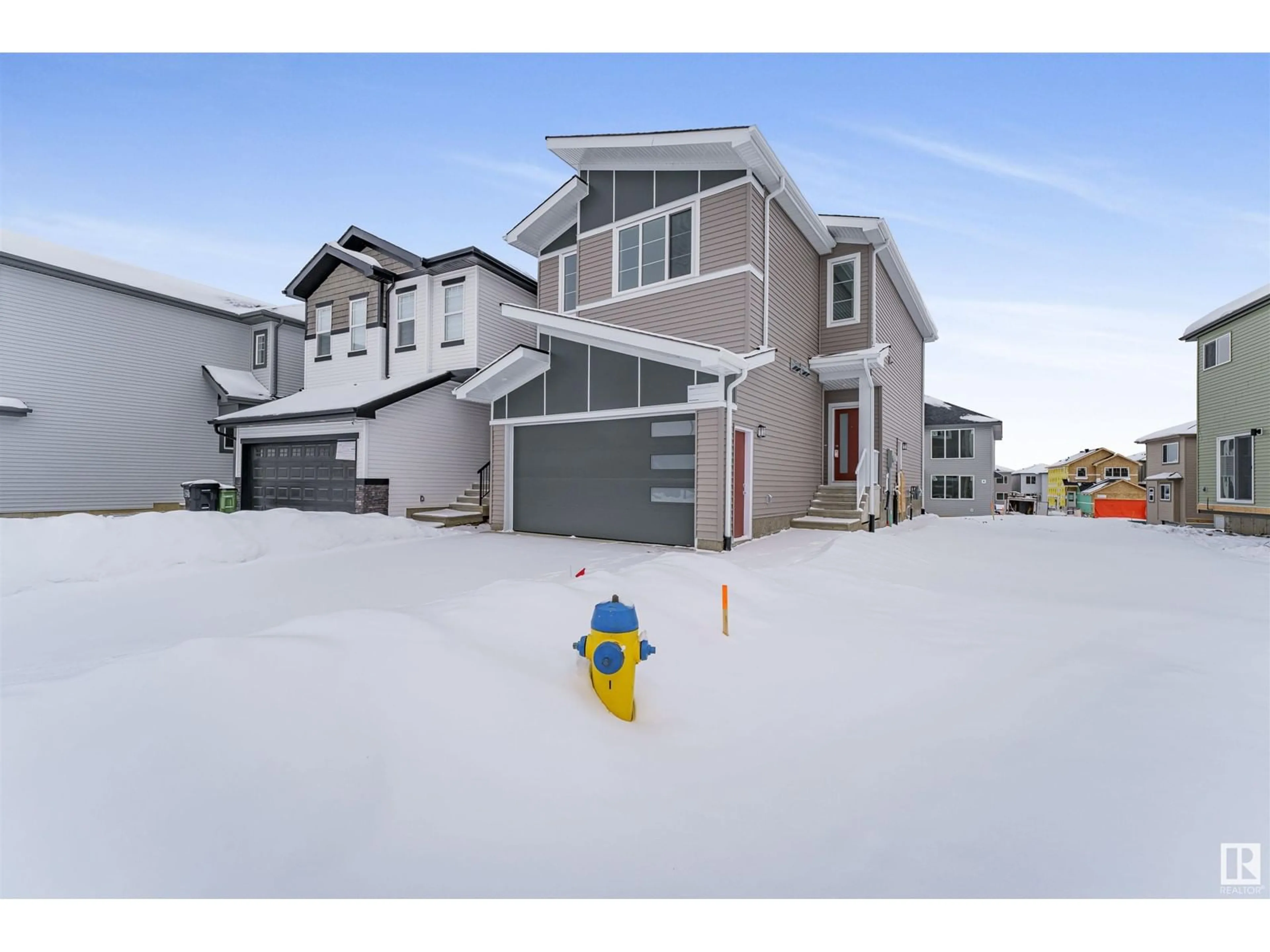A pic from outside/outdoor area/front of a property/back of a property/a pic from drone, street for 1304 11 AV, Edmonton Alberta T6T2W3