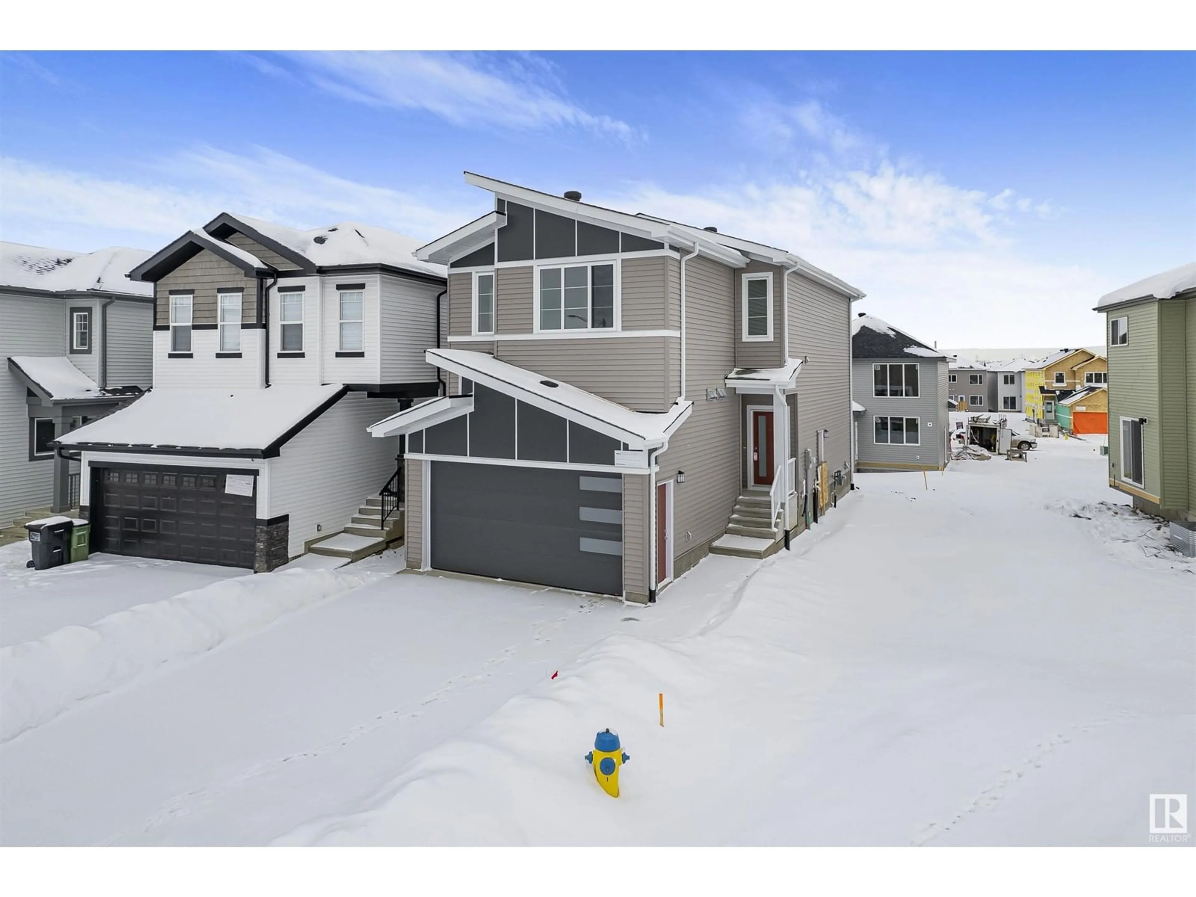 A pic from outside/outdoor area/front of a property/back of a property/a pic from drone, street for 1304 11 AV, Edmonton Alberta T6T2W3