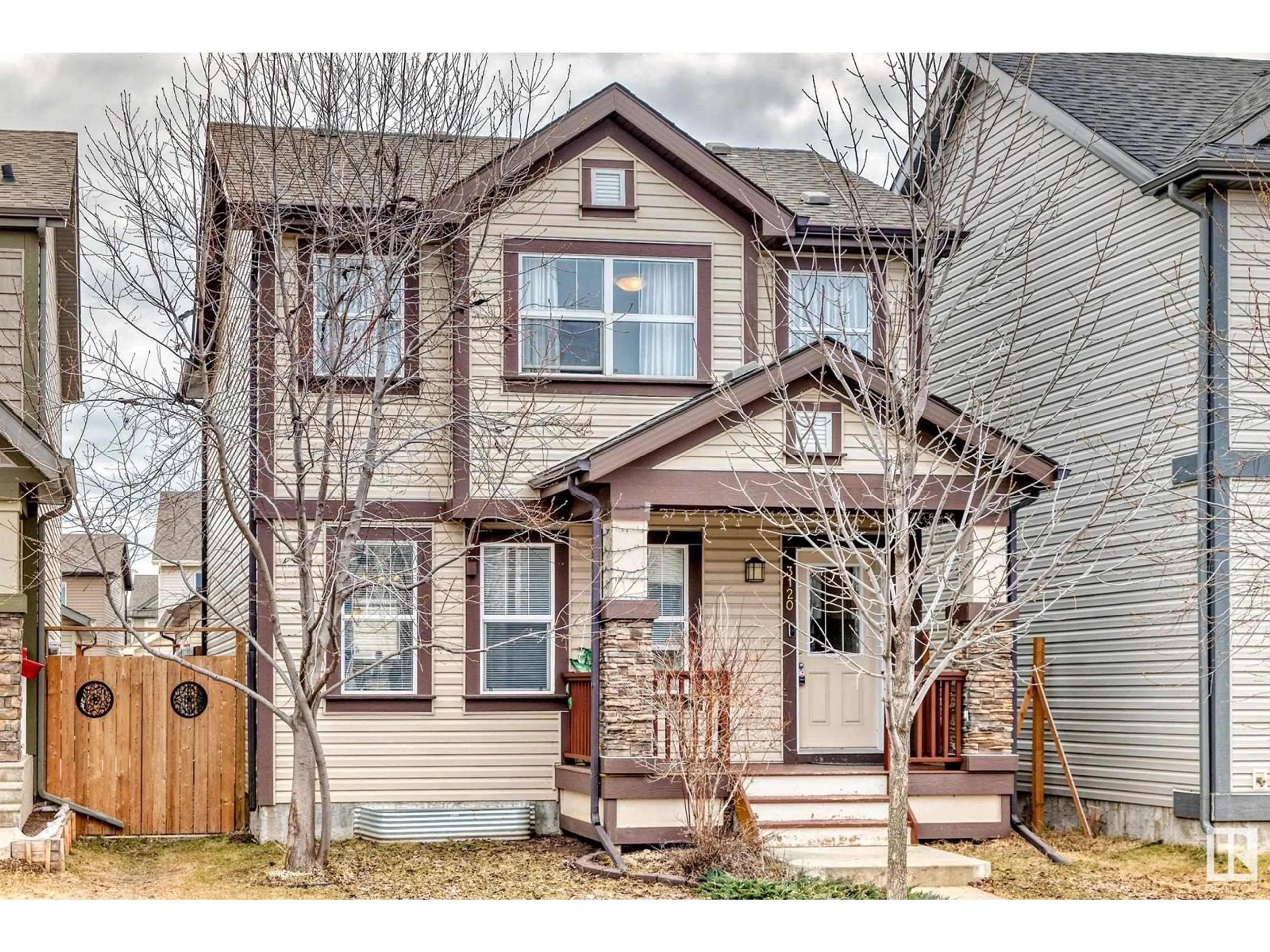 Home with vinyl exterior material, street for 3120 ARTHURS CR, Edmonton Alberta T6W2H7