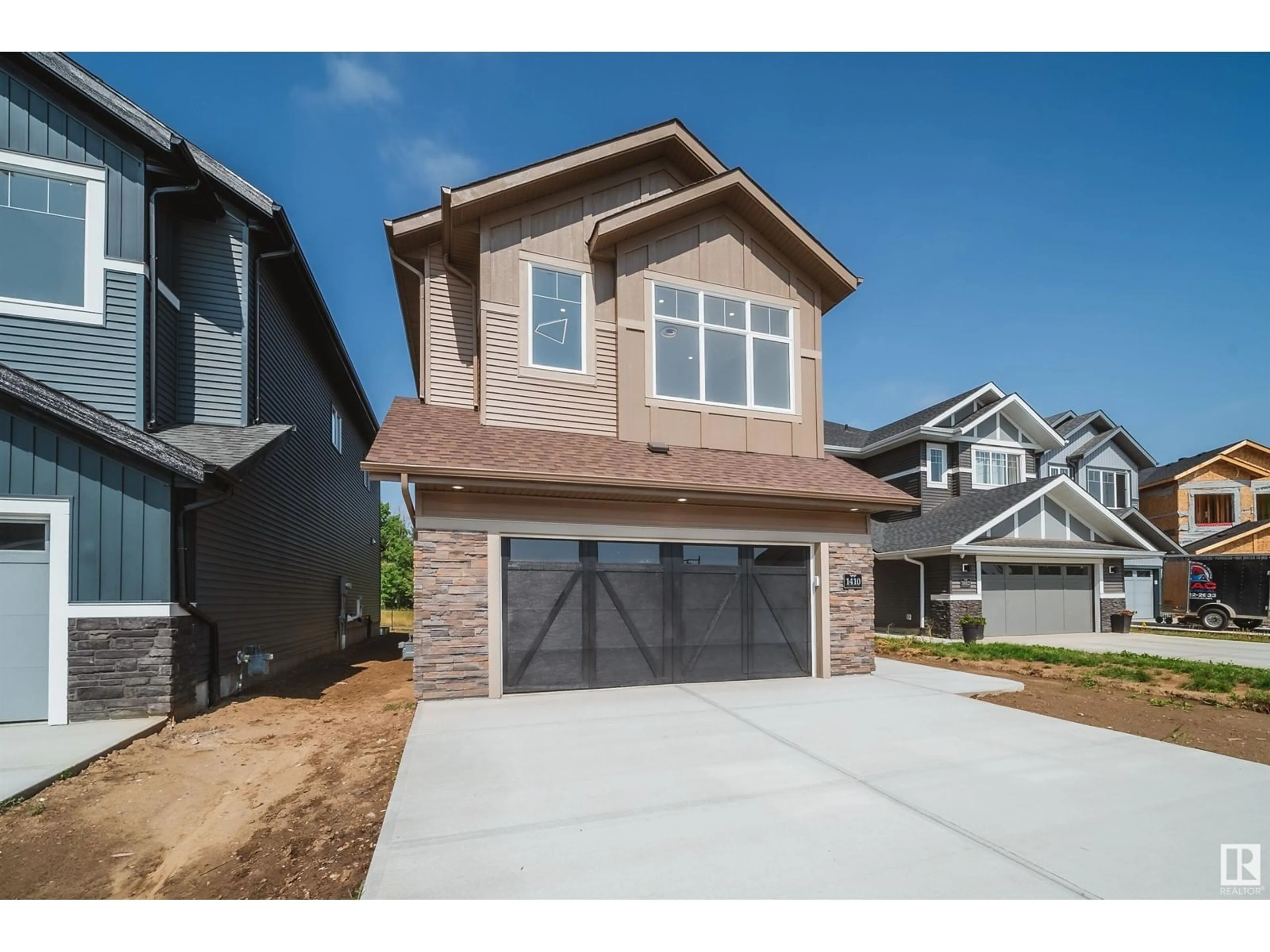 Home with brick exterior material, street for 1410 ENRIGHT LD, Edmonton Alberta T6M0Z1