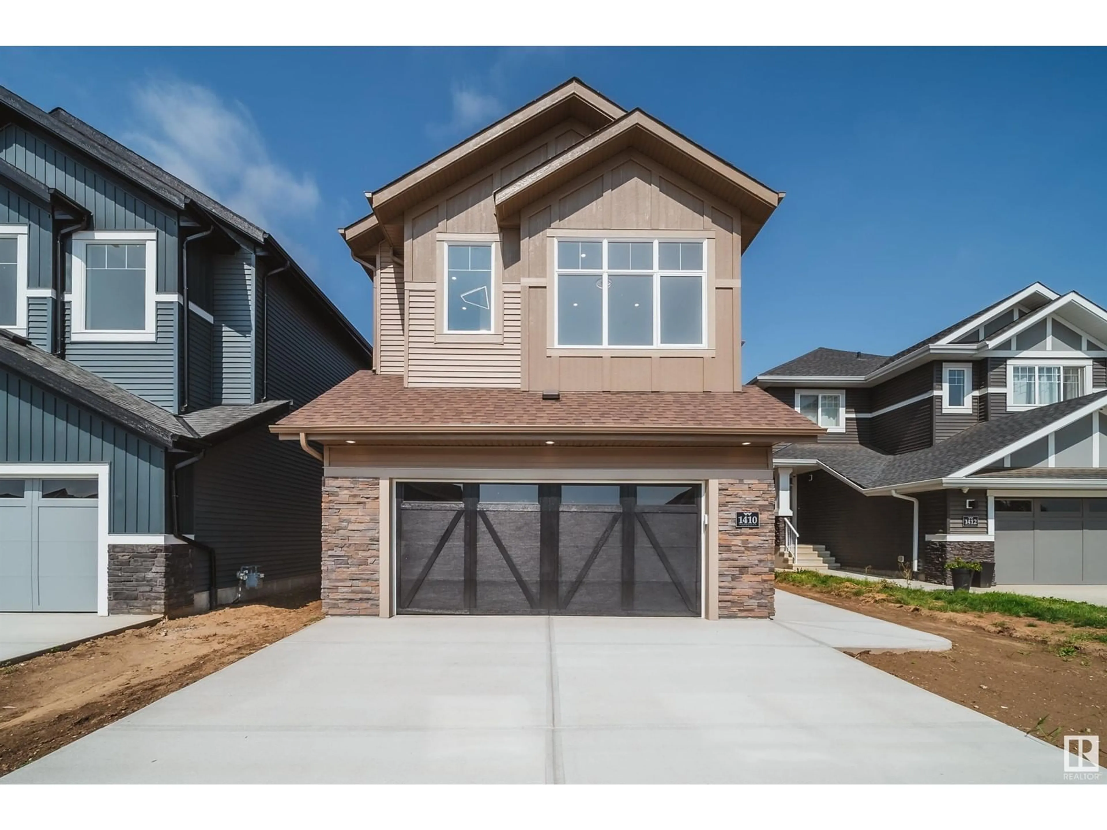 Home with brick exterior material, street for 1410 ENRIGHT LD, Edmonton Alberta T6M0Z1