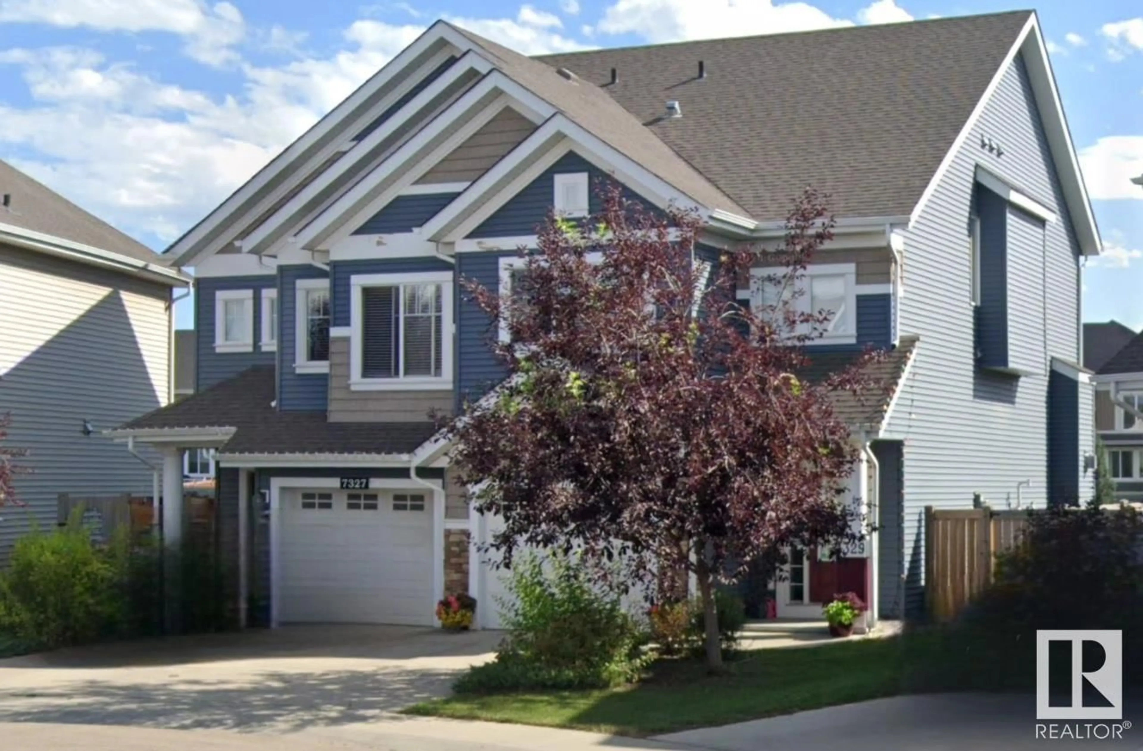 Home with vinyl exterior material, street for SW - 7327 24 AV, Edmonton Alberta T6X0V5