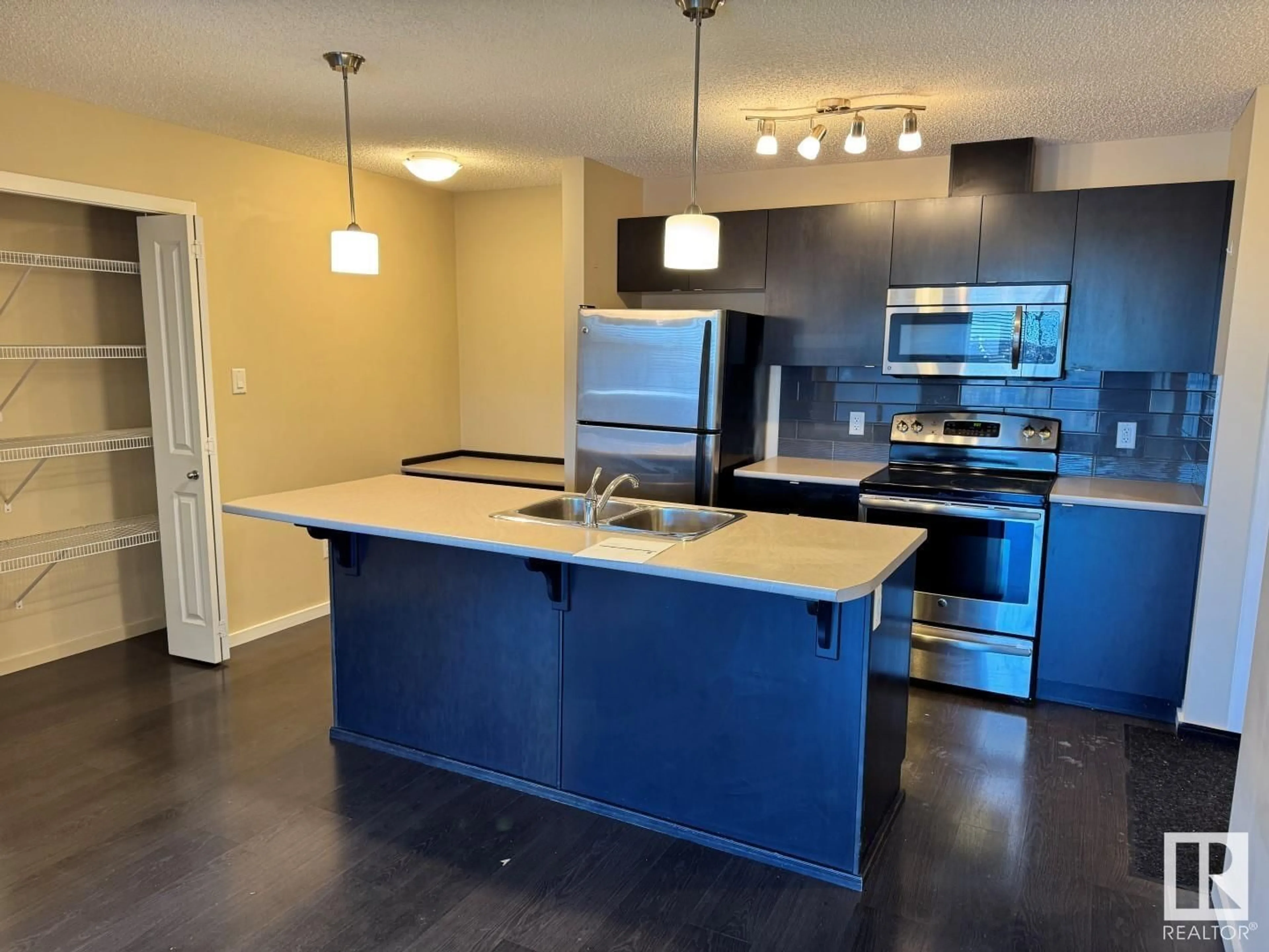 Open concept kitchen, unknown for #401 - 508 ALBANY WY, Edmonton Alberta T6V0L1