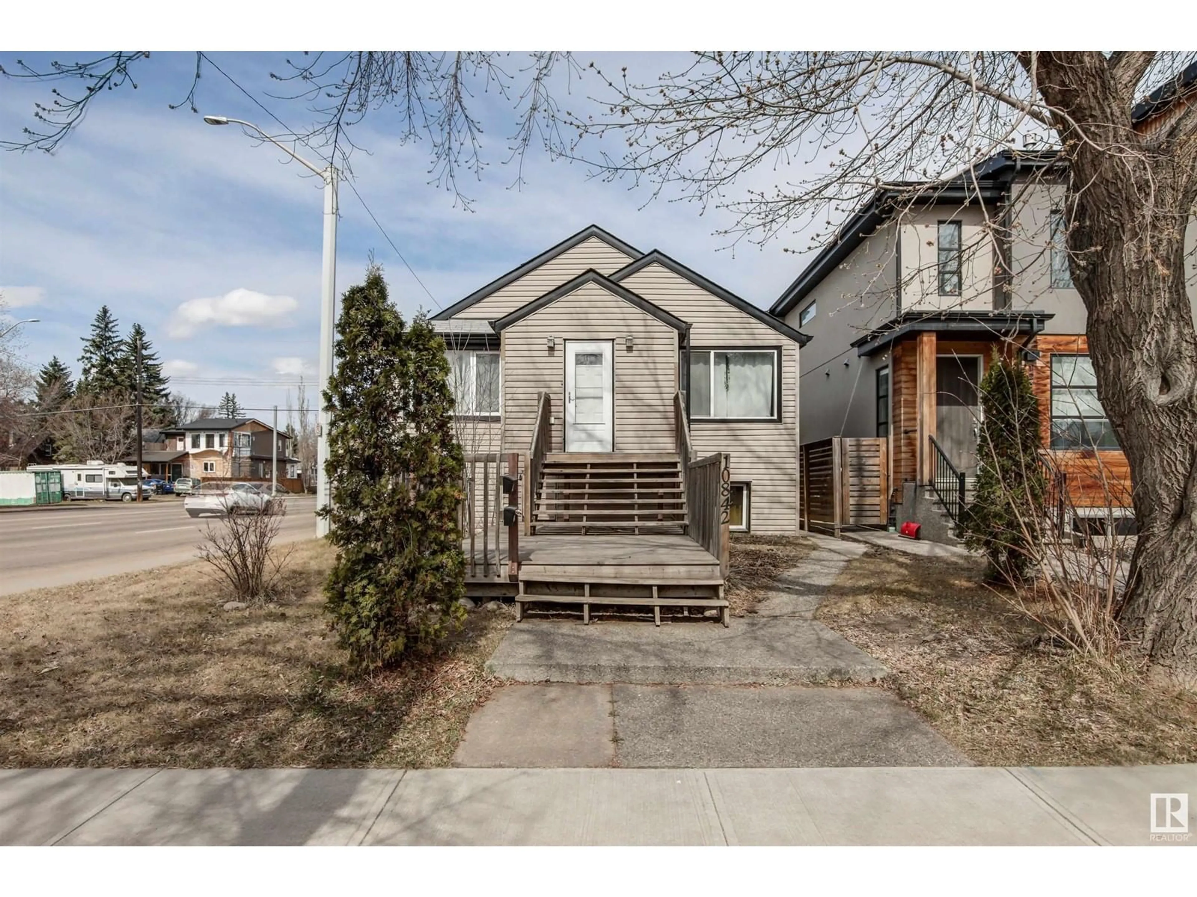 Home with brick exterior material, street for 10842 66 AV NW, Edmonton Alberta T6H1X9