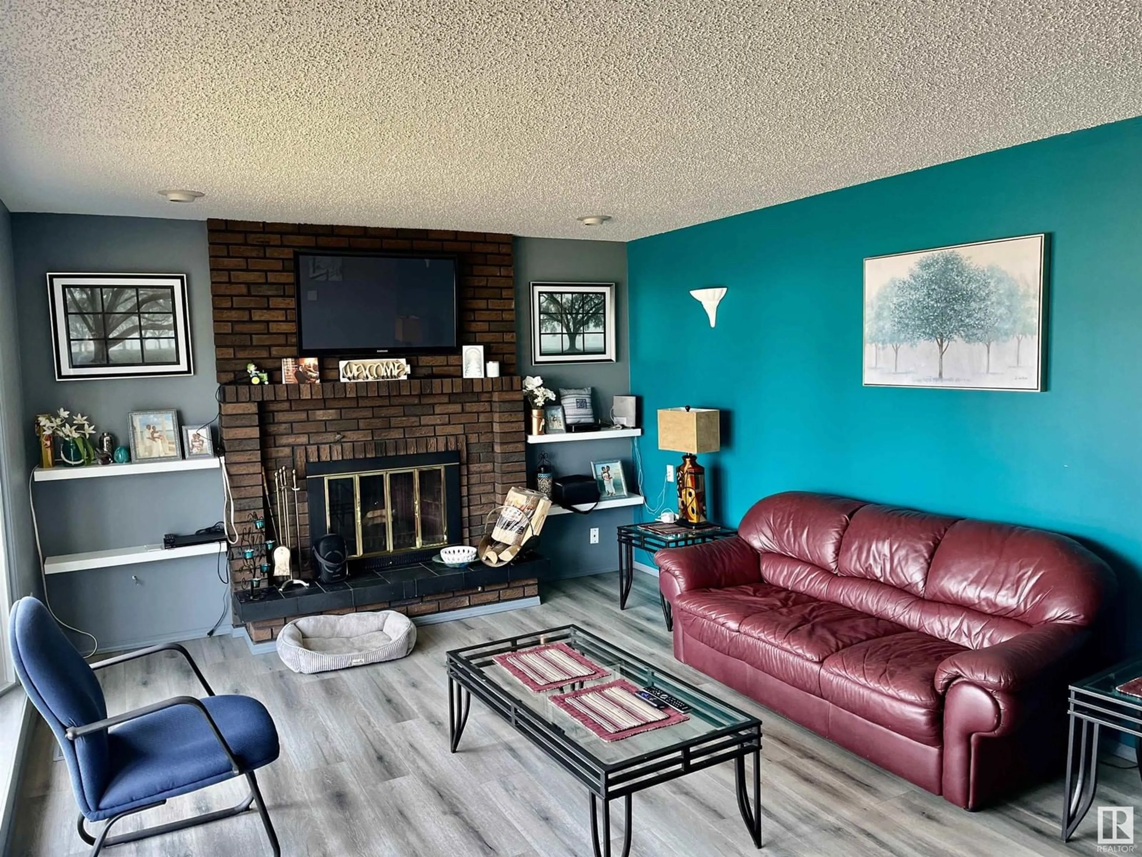 Living room with furniture, wood/laminate floor for 4505 55 AV, Smoky Lake Town Alberta T0Z3C0