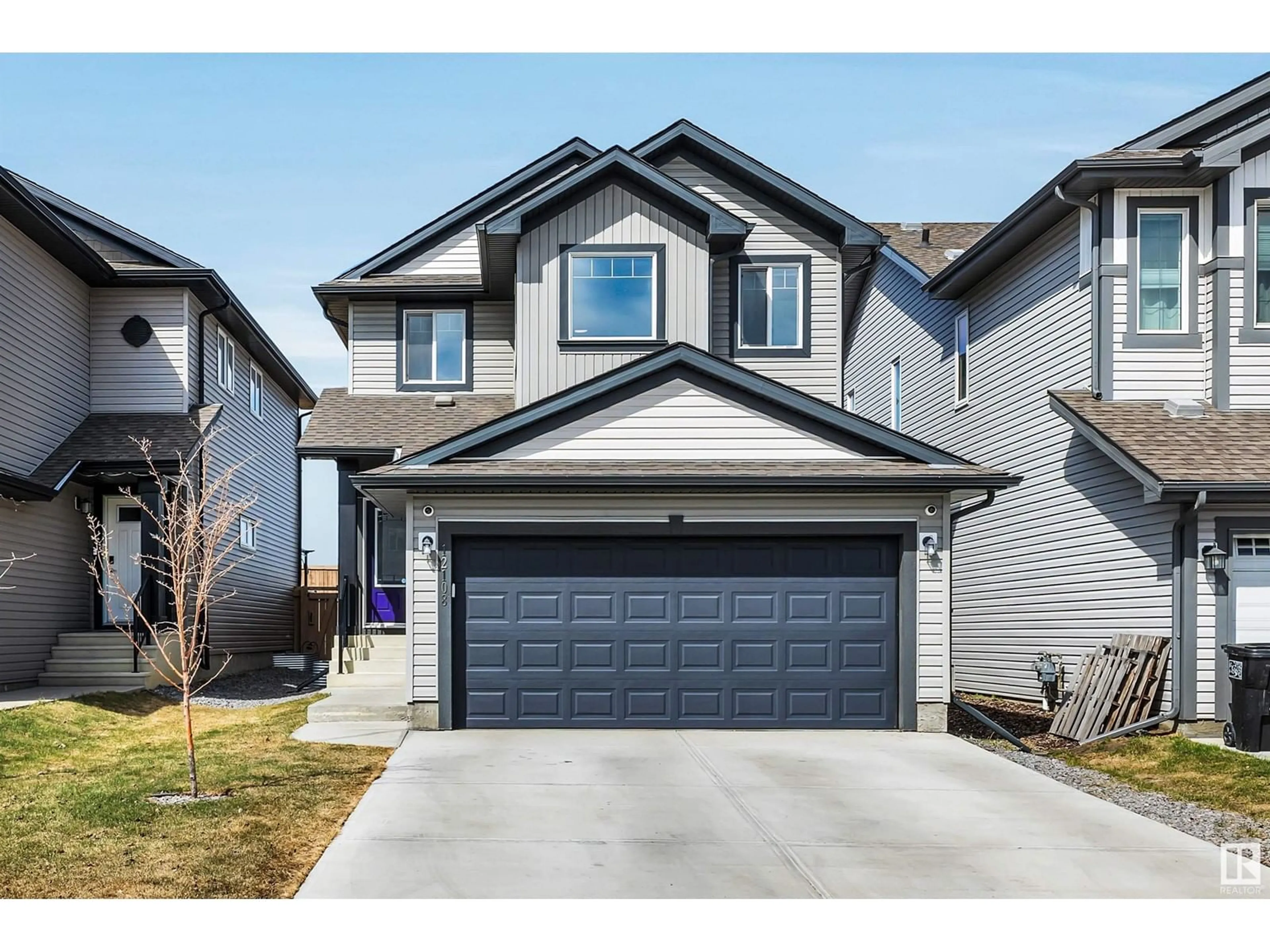 Home with vinyl exterior material, street for NW - 12108 177 AV, Edmonton Alberta T5X0K9