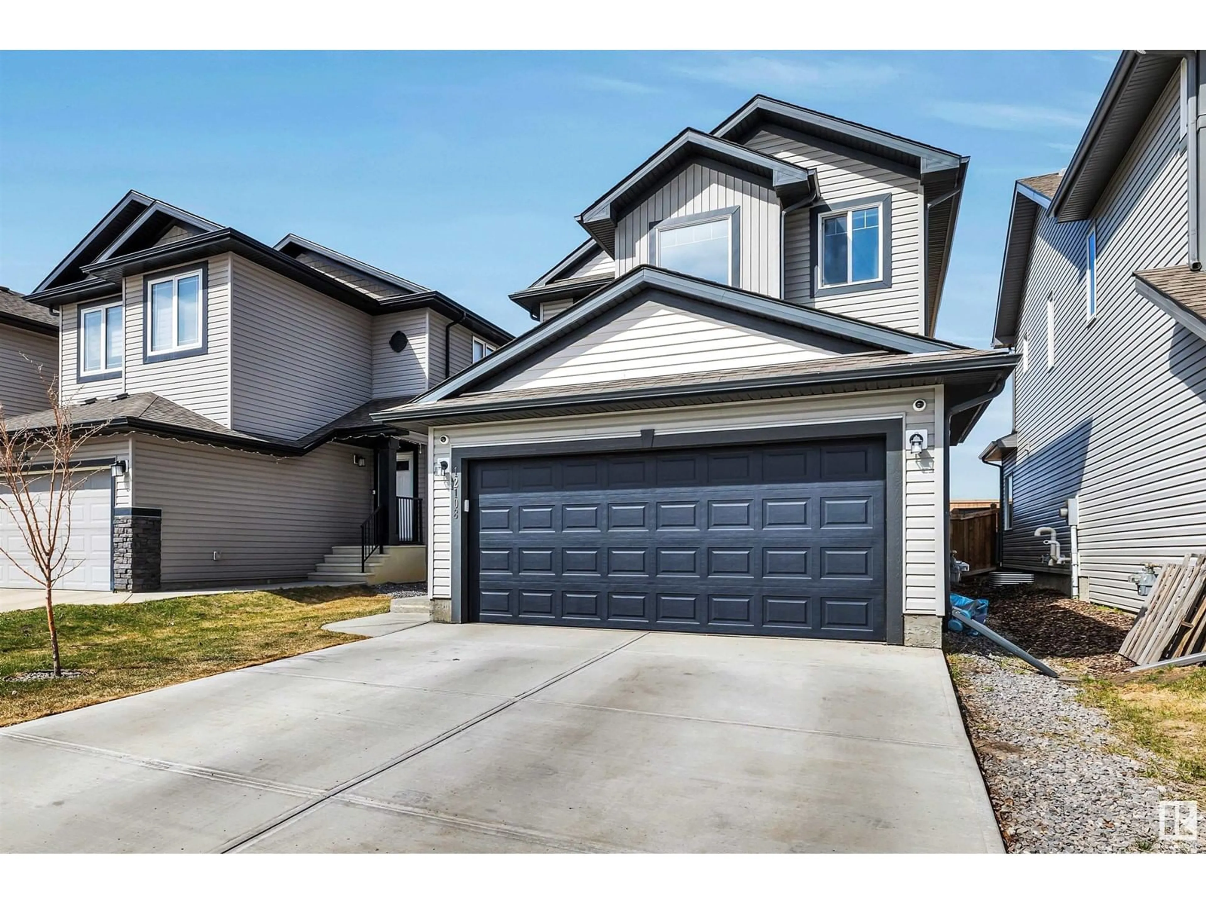 Home with vinyl exterior material, street for NW - 12108 177 AV, Edmonton Alberta T5X0K9