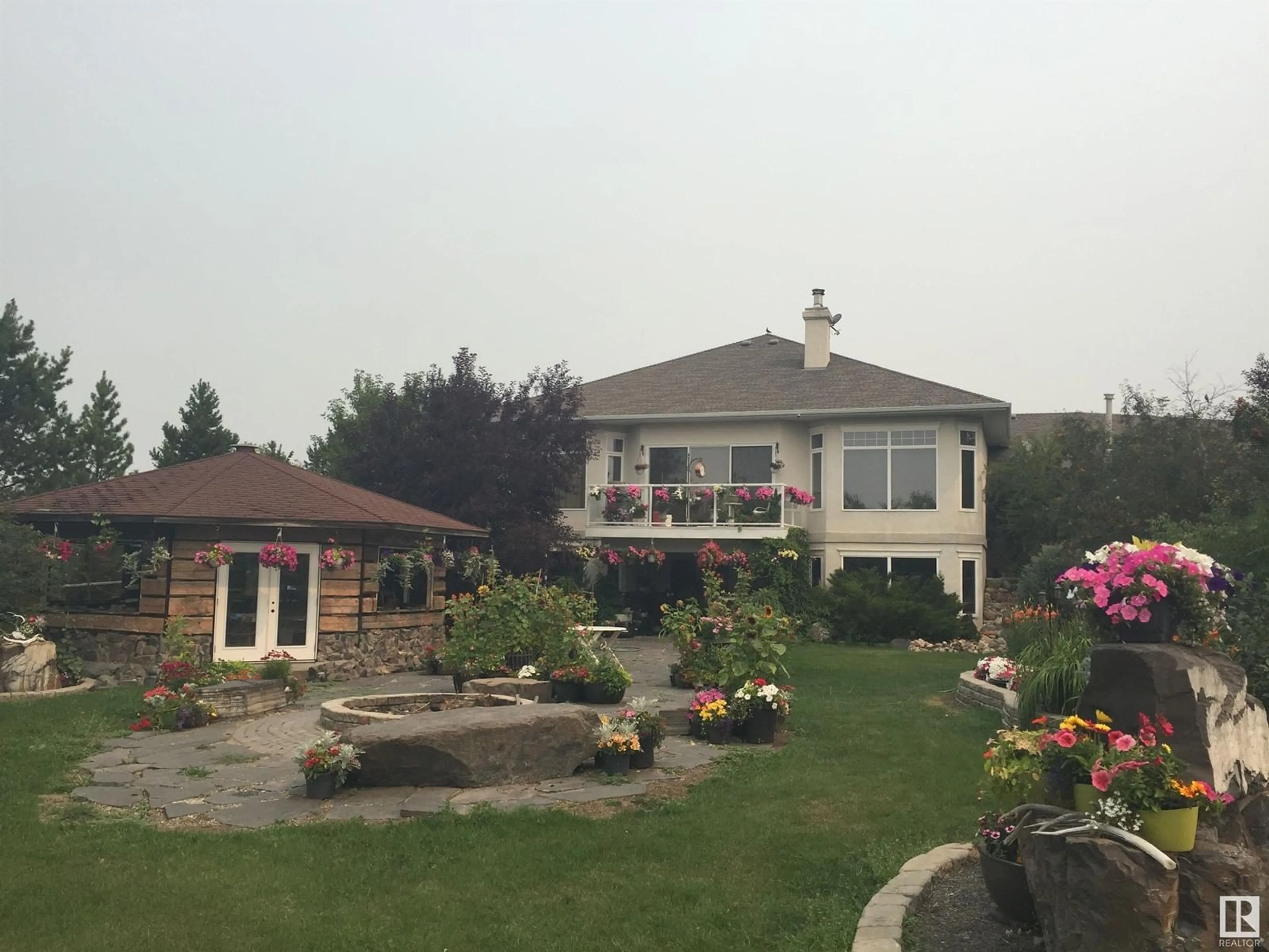 A pic from outside/outdoor area/front of a property/back of a property/a pic from drone, mountain view for 51208 RGE ROAD 233, Rural Strathcona County Alberta T8B1K8