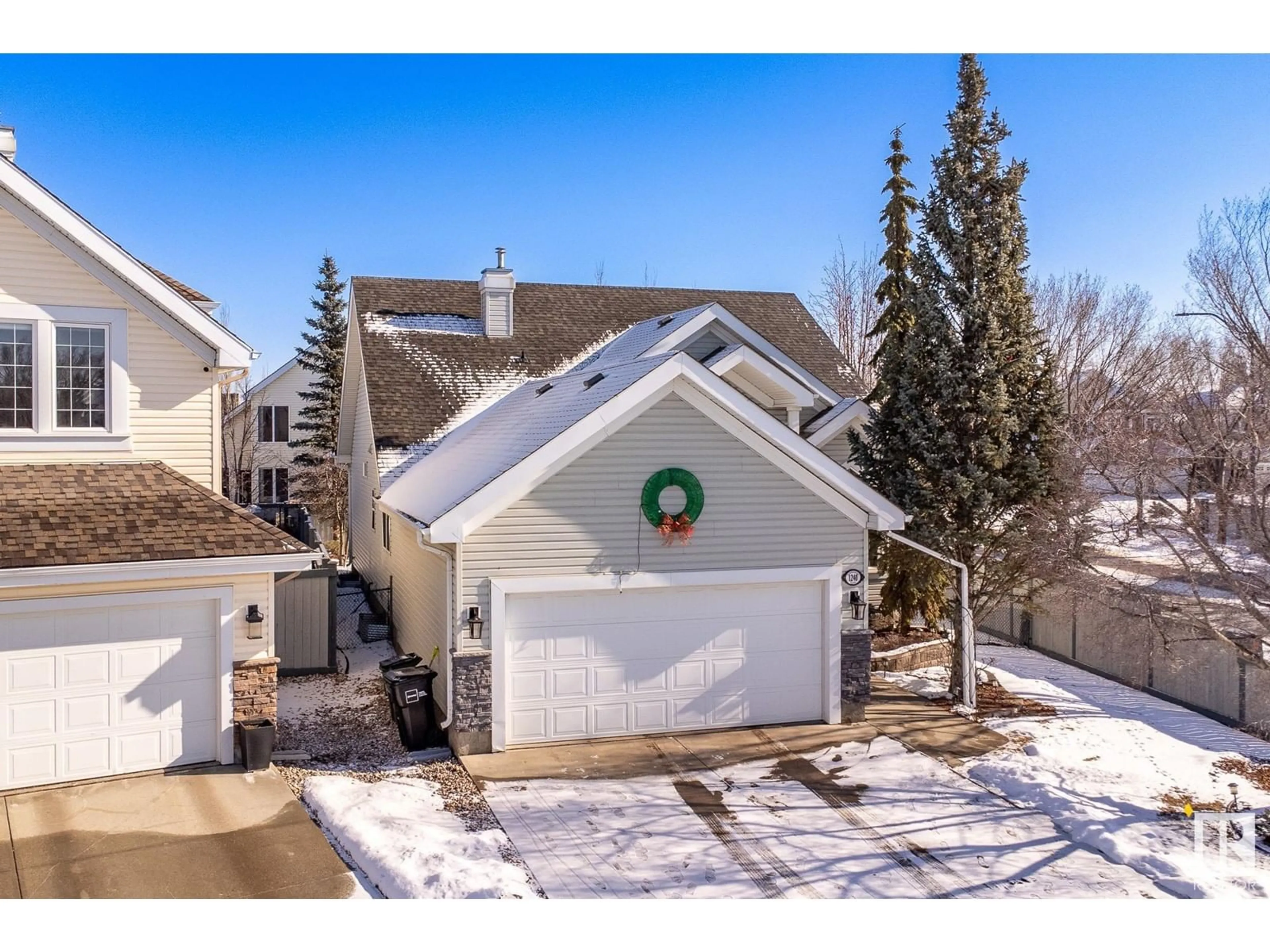 A pic from outside/outdoor area/front of a property/back of a property/a pic from drone, unknown for 1240 SUMMERSIDE DR, Edmonton Alberta T6X1B1