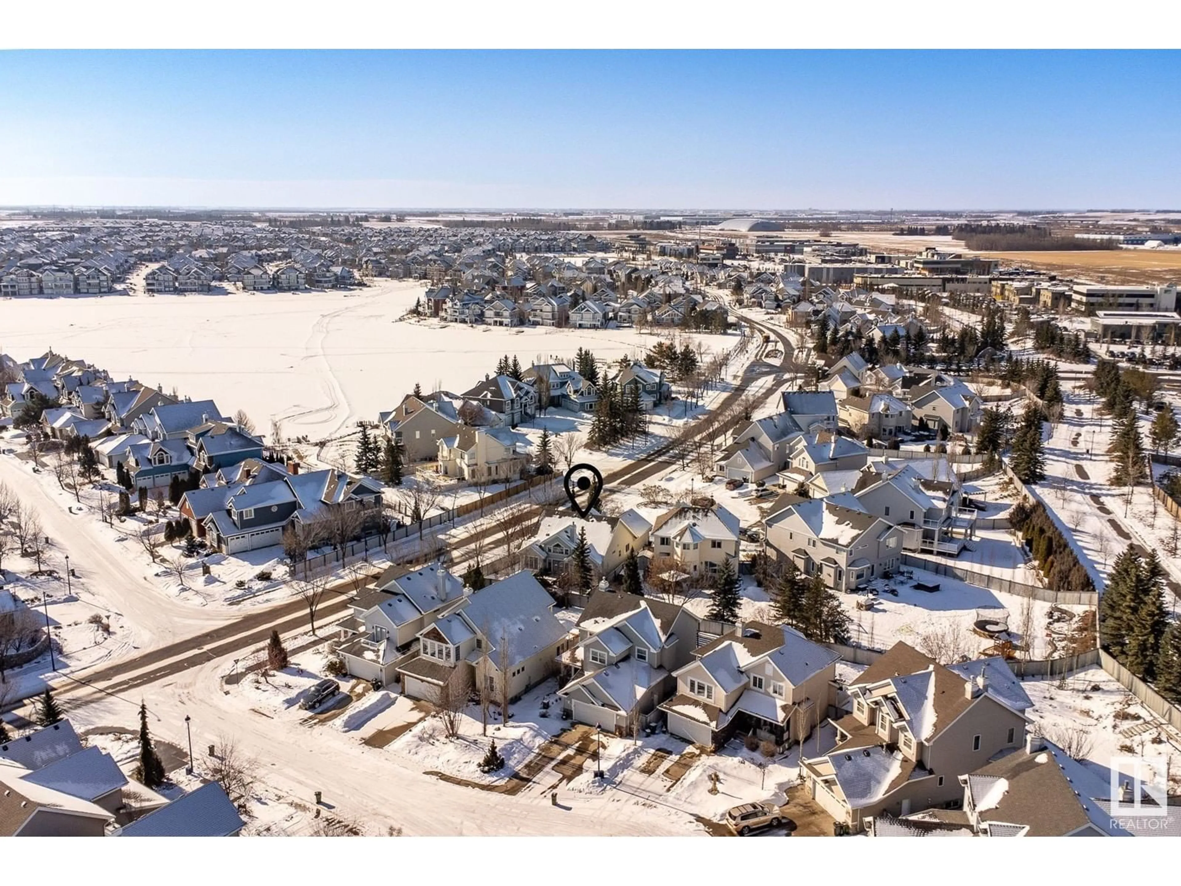 A pic from outside/outdoor area/front of a property/back of a property/a pic from drone, street for 1240 SUMMERSIDE DR, Edmonton Alberta T6X1B1
