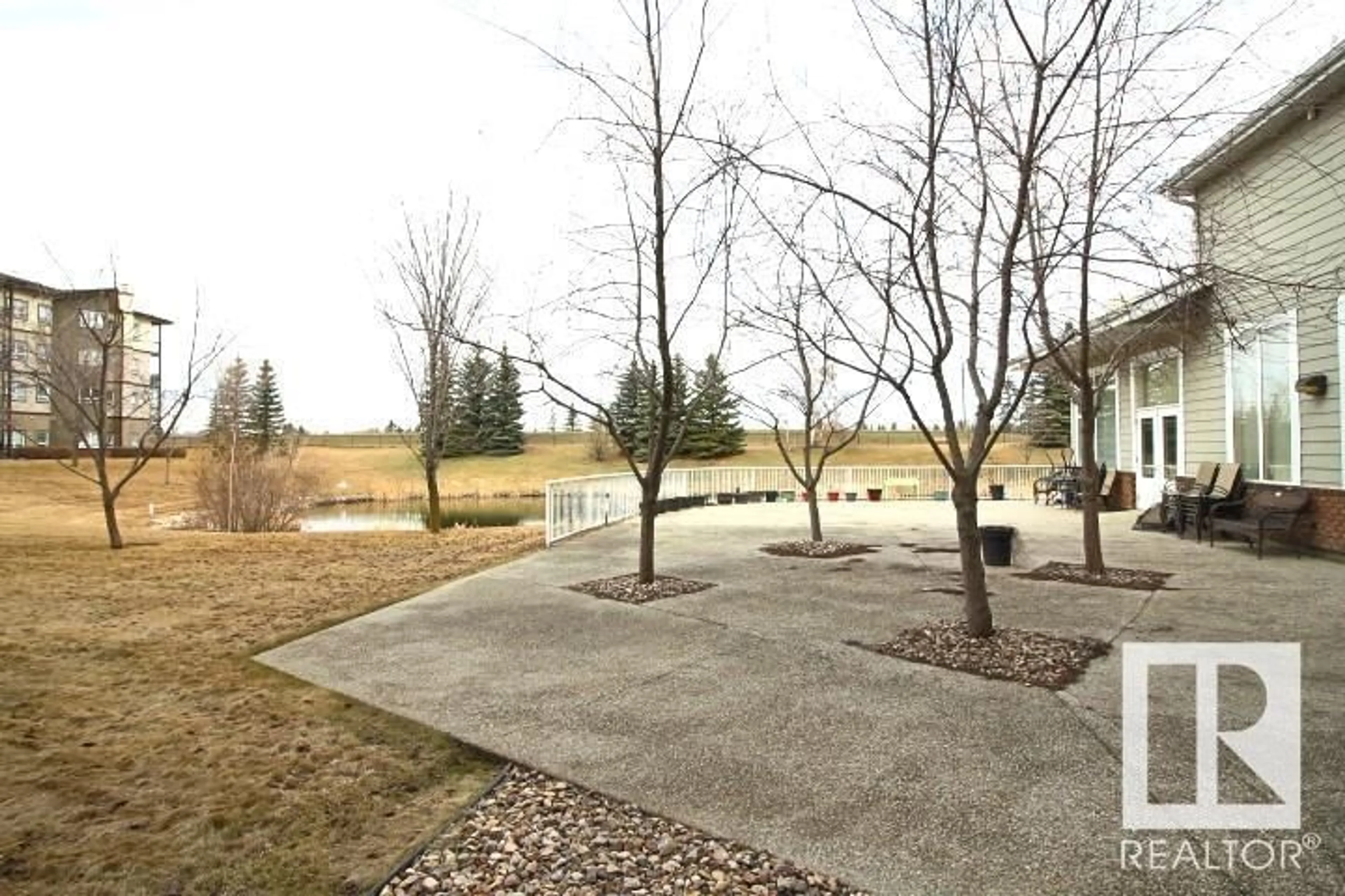 Patio, water/lake/river/ocean view for 8802 - 120 SOUTHFORT DR, Fort Saskatchewan Alberta T8L4R6