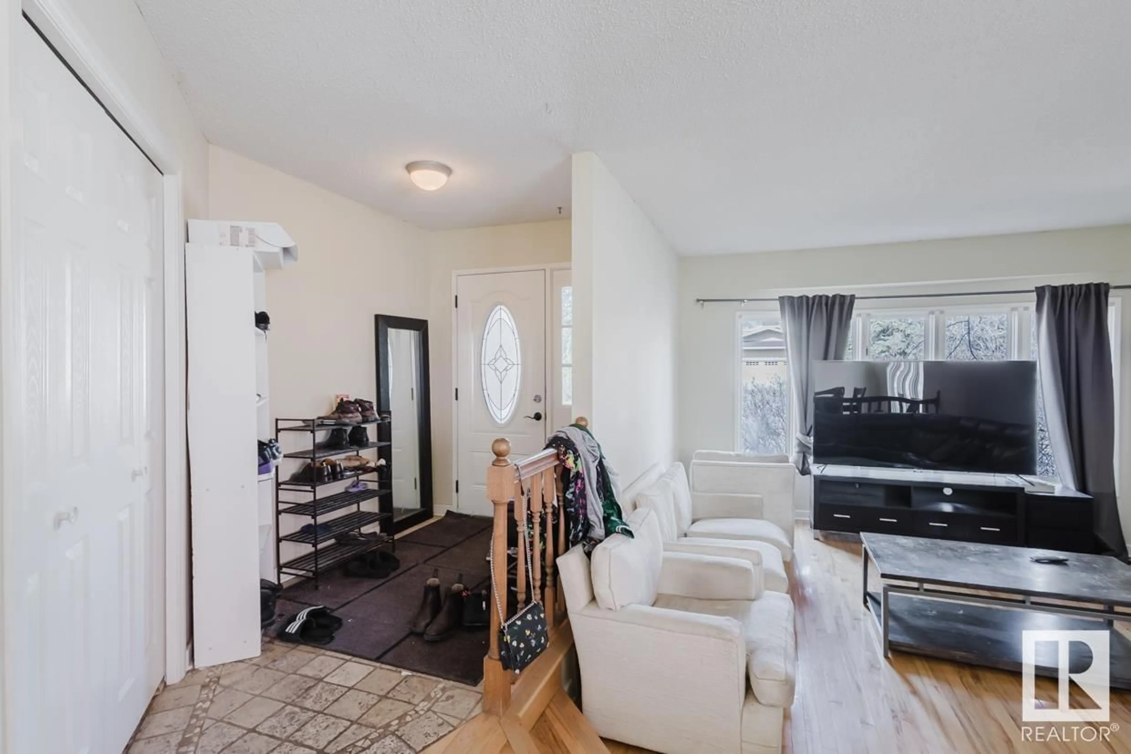 Living room with furniture, unknown for 2404 113 ST, Edmonton Alberta T6J4Y5