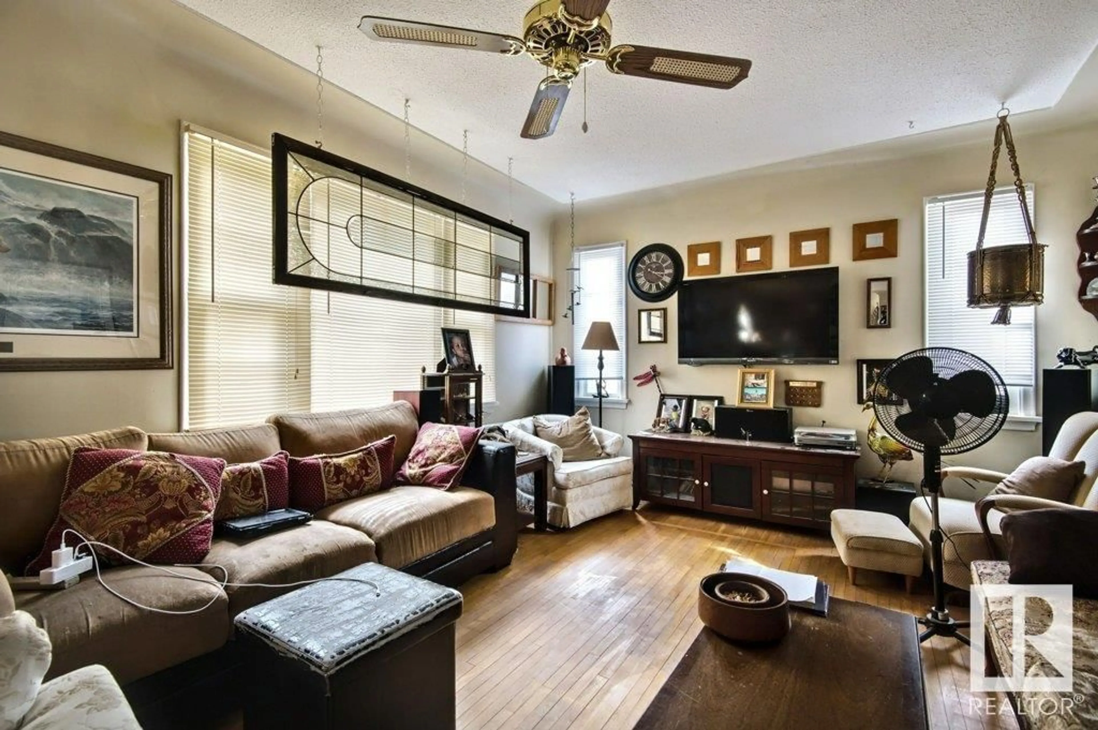 Living room with furniture, wood/laminate floor for 5106 49 AV, Andrew Alberta T0B0C0