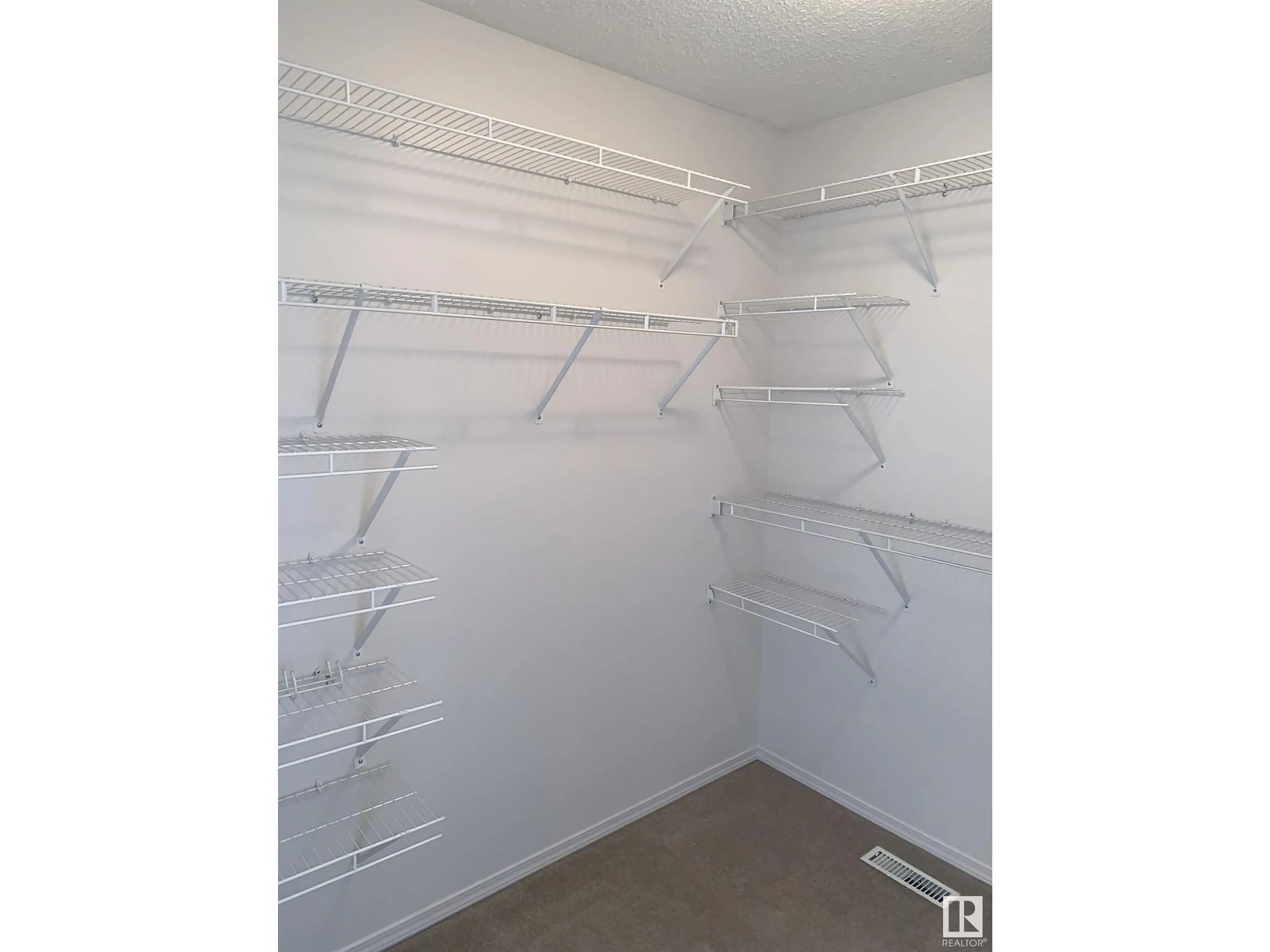 Storage room or clothes room or walk-in closet for 207 ARBOUR MEADOWS CL, Calgary Alberta T3G5J3