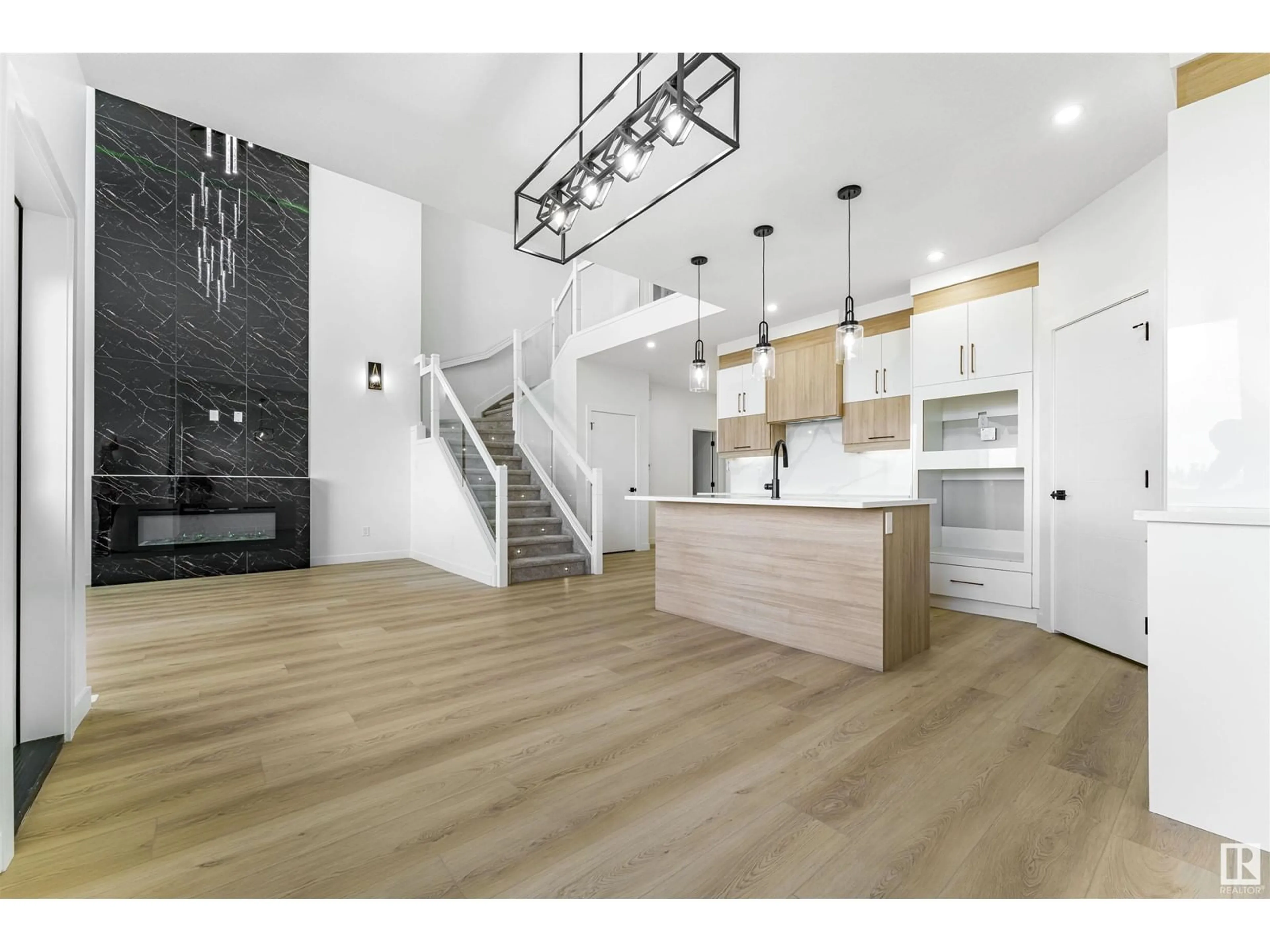 Open concept kitchen, wood/laminate floor for 76 HAZELWOOD LANE, Spruce Grove Alberta T7X0R7