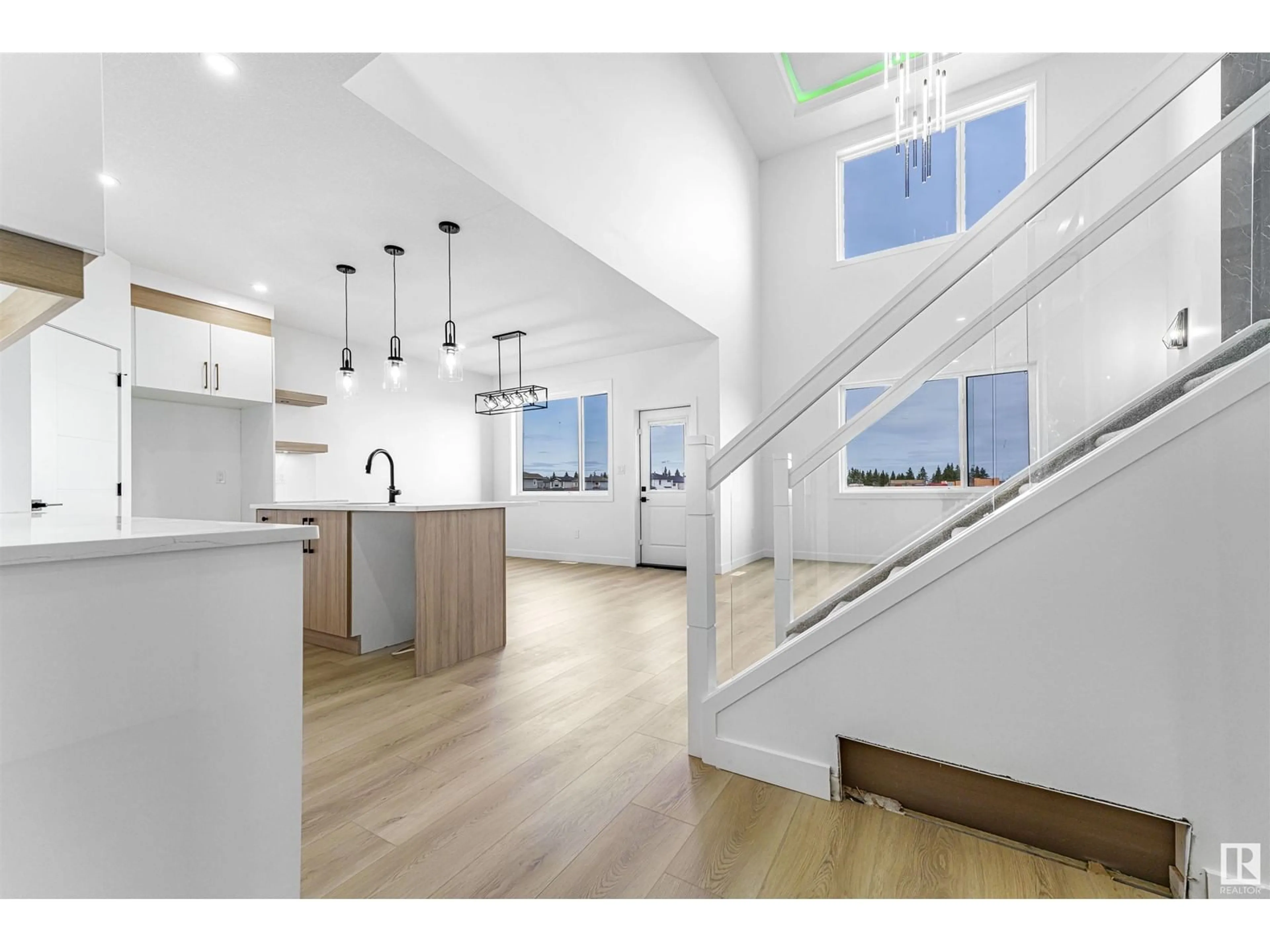 Open concept kitchen, wood/laminate floor for 76 HAZELWOOD LANE, Spruce Grove Alberta T7X0R7