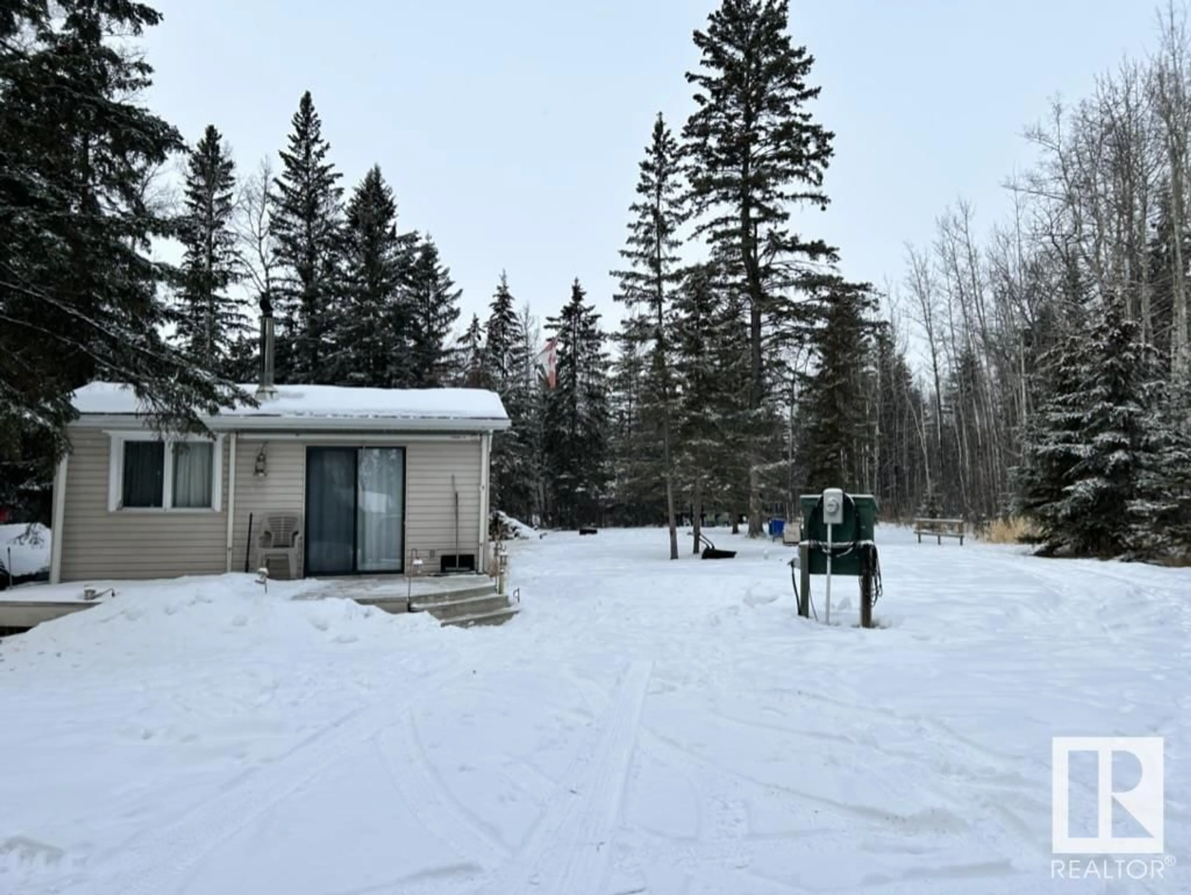 A pic from outside/outdoor area/front of a property/back of a property/a pic from drone, forest/trees view for 318 55061 TWP ROAD 462, Rural Wetaskiwin County Alberta T0C0T0