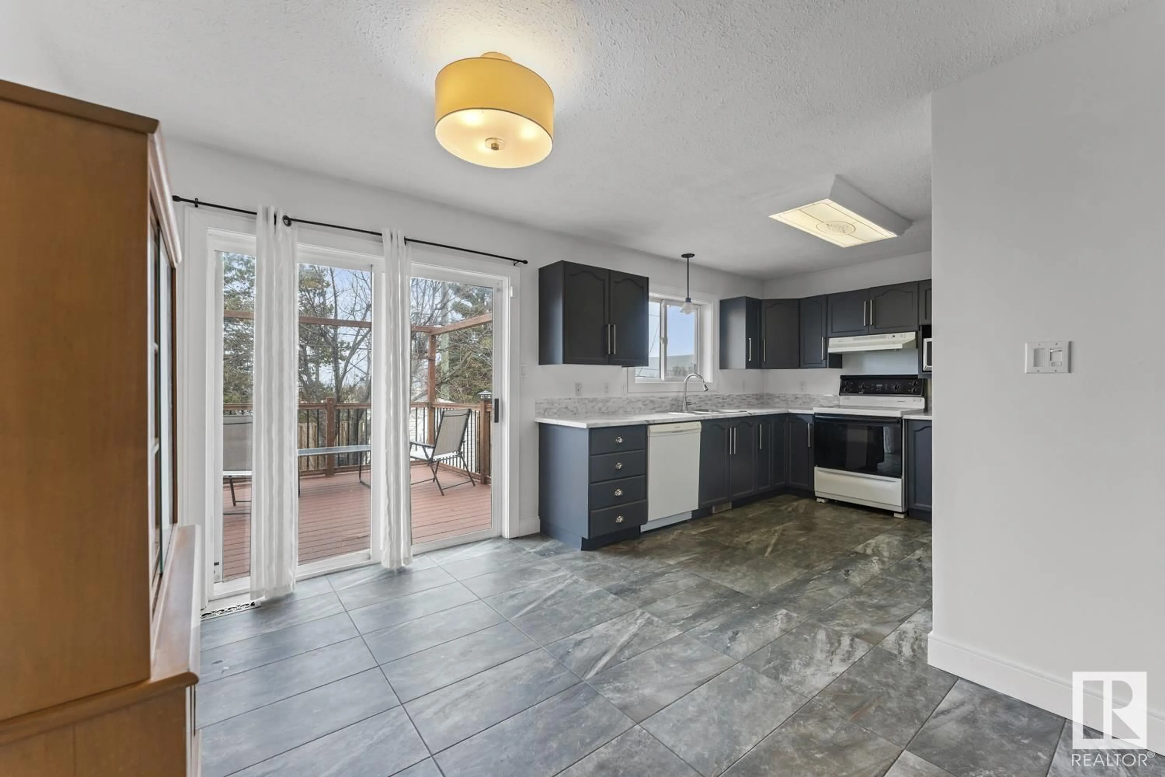 Open concept kitchen, ceramic/tile floor for 3 SAMMUT PL, Cold Lake Alberta T9M1L5