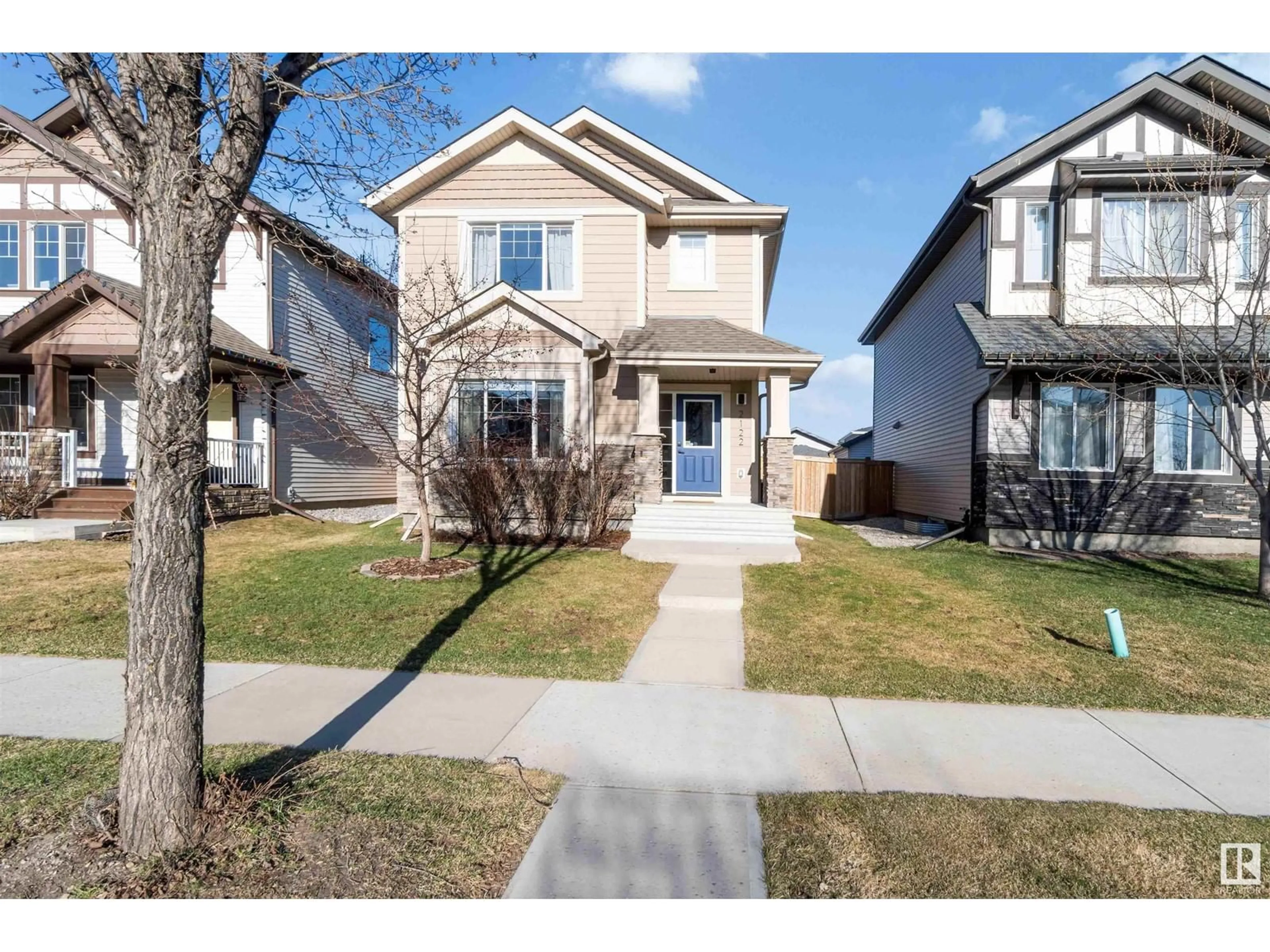 Home with vinyl exterior material, street for 2122 GLENRIDDING WY, Edmonton Alberta T6W2H4