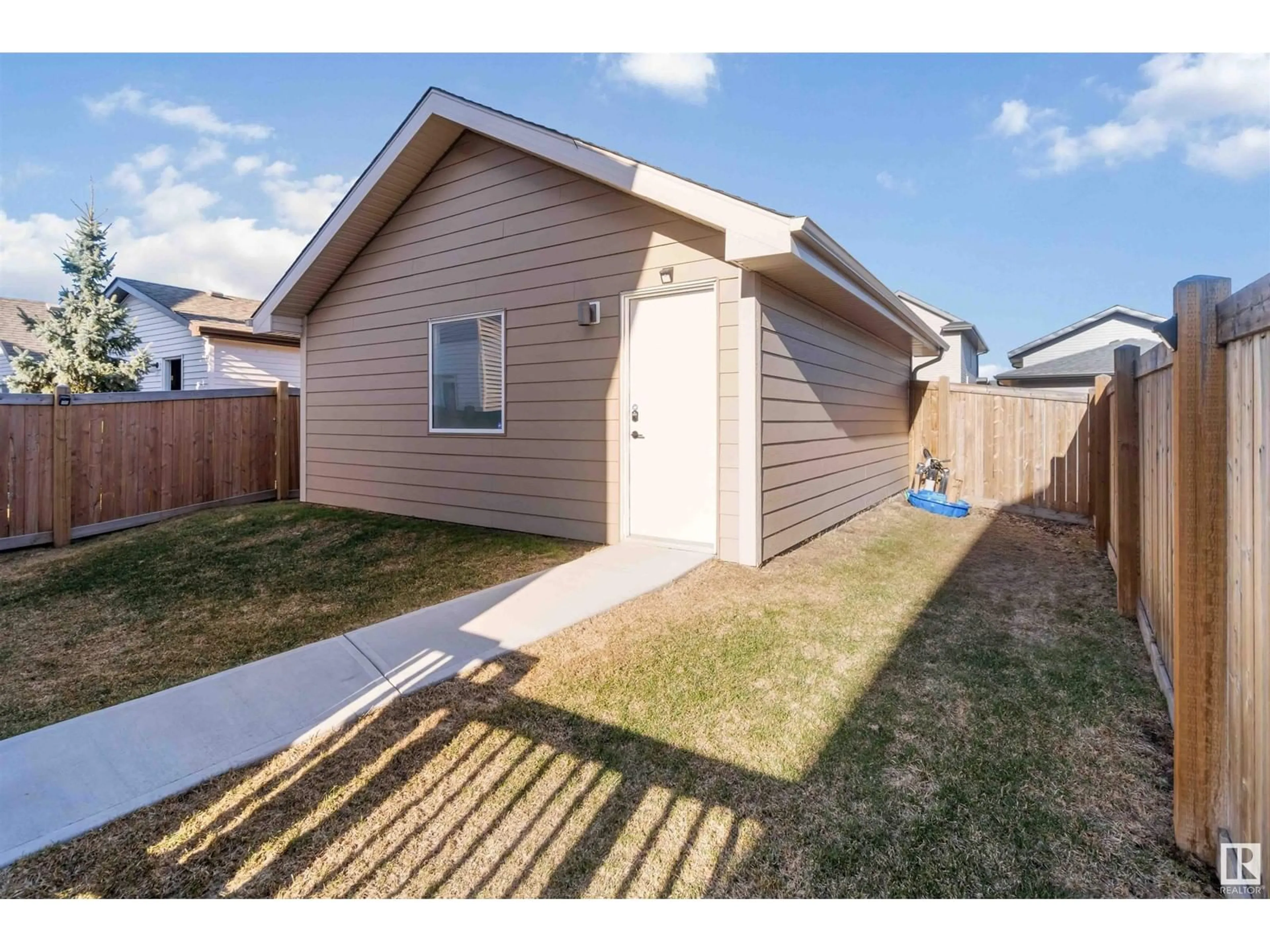 Home with vinyl exterior material, street for 2122 GLENRIDDING WY, Edmonton Alberta T6W2H4