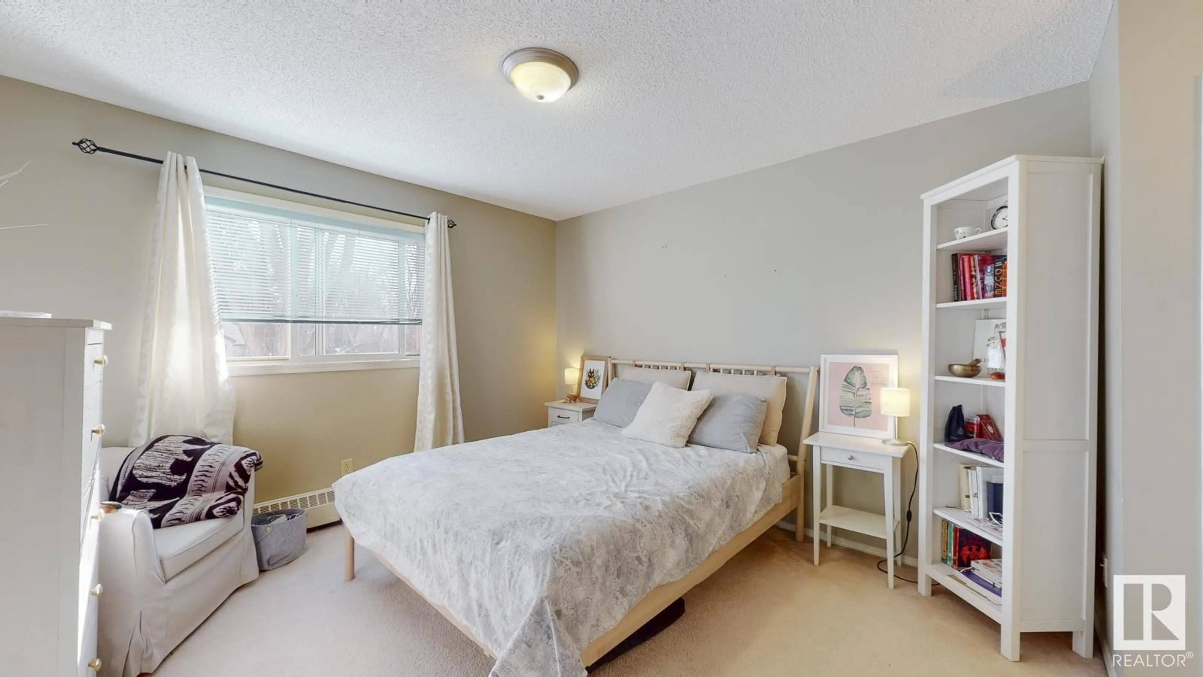 Bedroom with bed, wood/laminate floor for 202 - 8503 108 ST, Edmonton Alberta T6E6J9