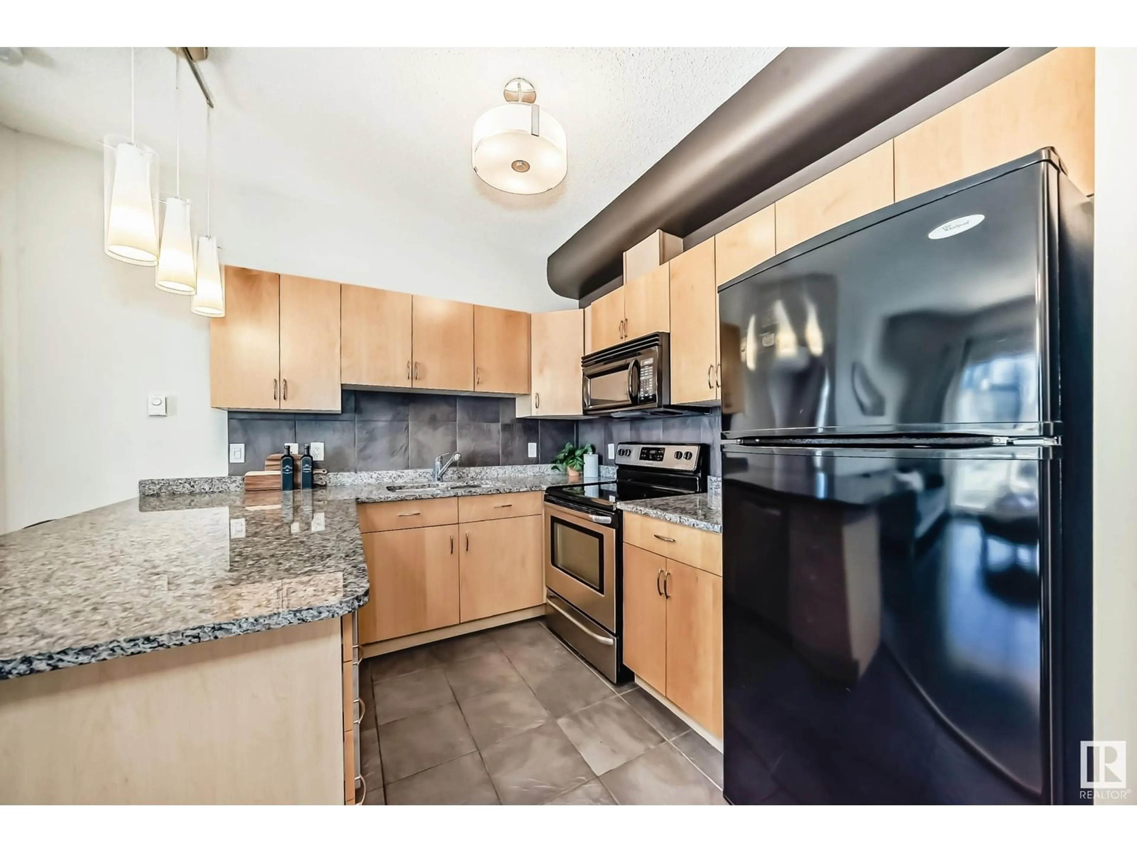 Standard kitchen, ceramic/tile floor for 309 - 10235 112 ST NW, Edmonton Alberta T5K1M7