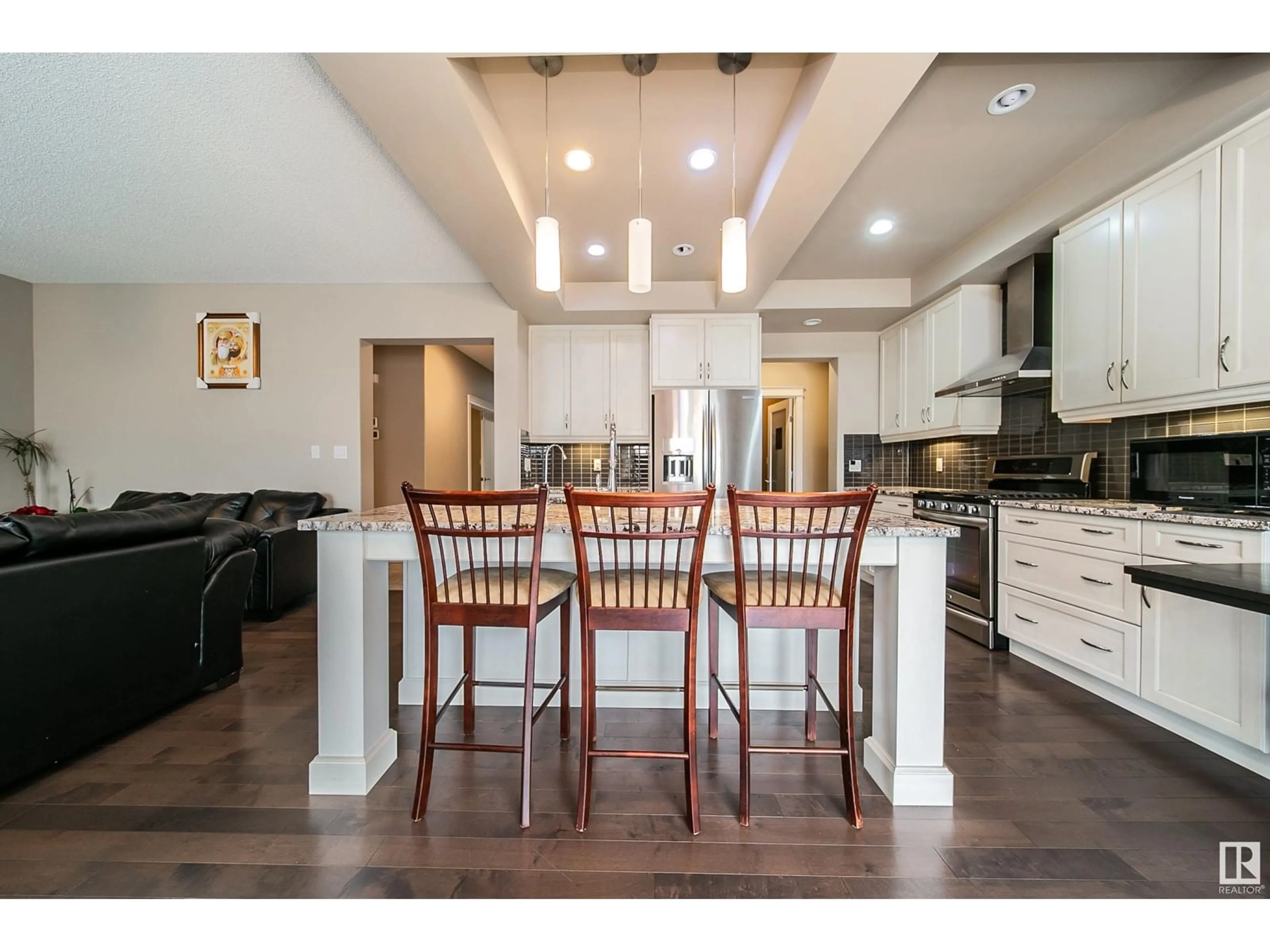 Open concept kitchen, wood/laminate floor for SW - 3203 WINSPEAR CR, Edmonton Alberta T6X1S7