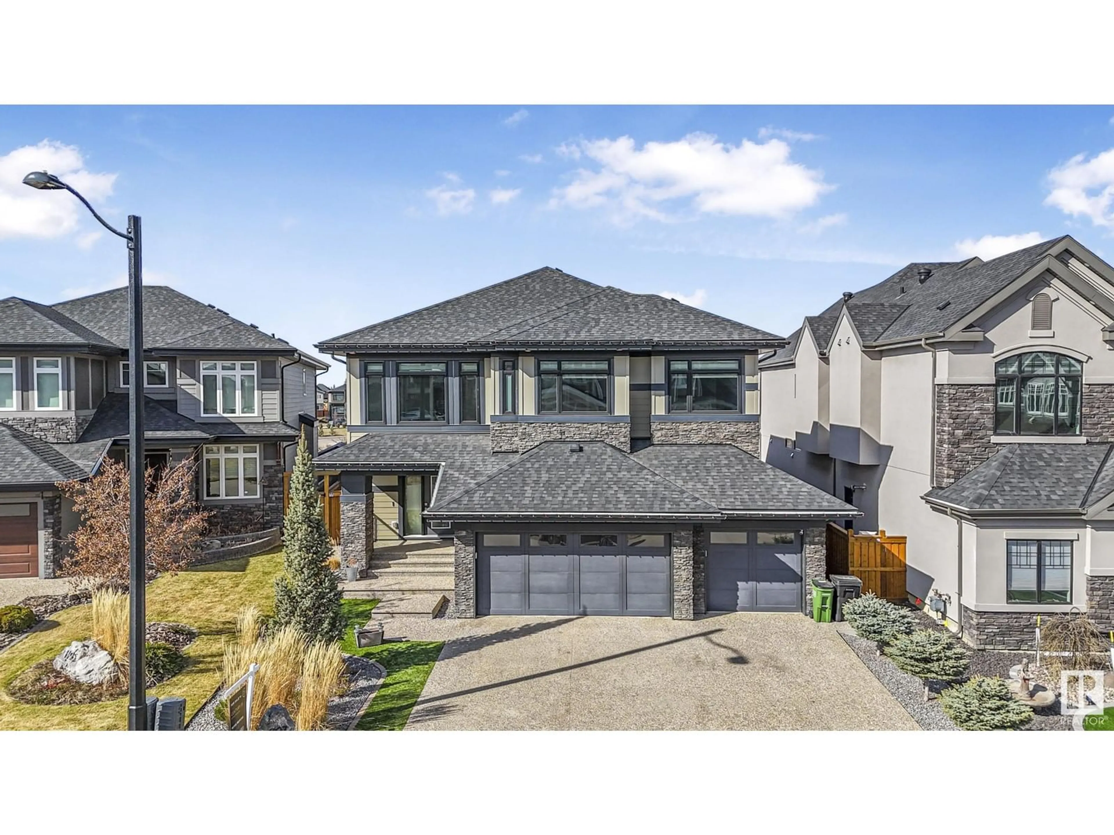 A pic from outside/outdoor area/front of a property/back of a property/a pic from drone, street for SW - 1197 HAINSTOCK GR, Edmonton Alberta T6W3B6