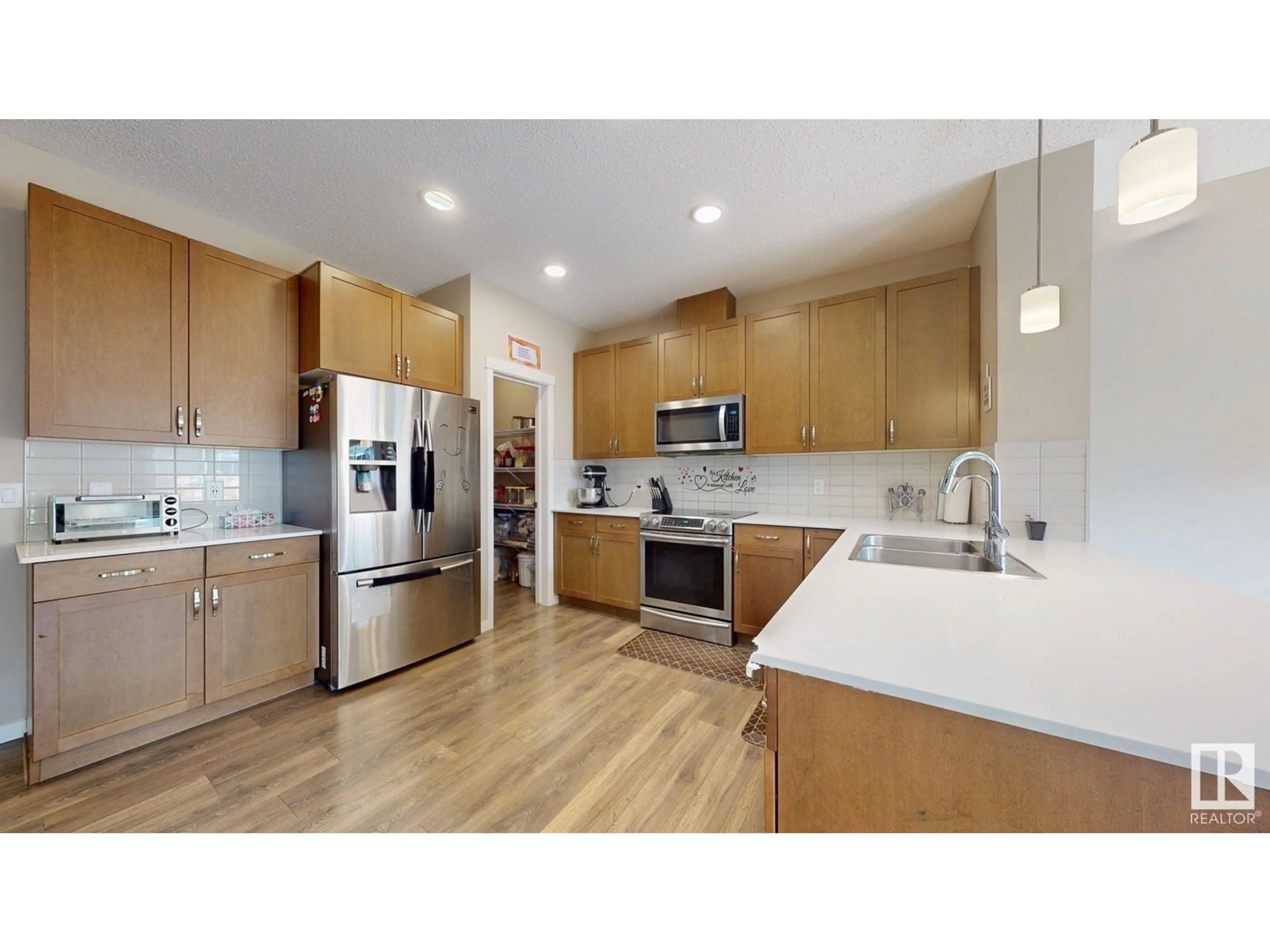 Open concept kitchen, unknown for 1303 27 ST, Edmonton Alberta T6T0K1