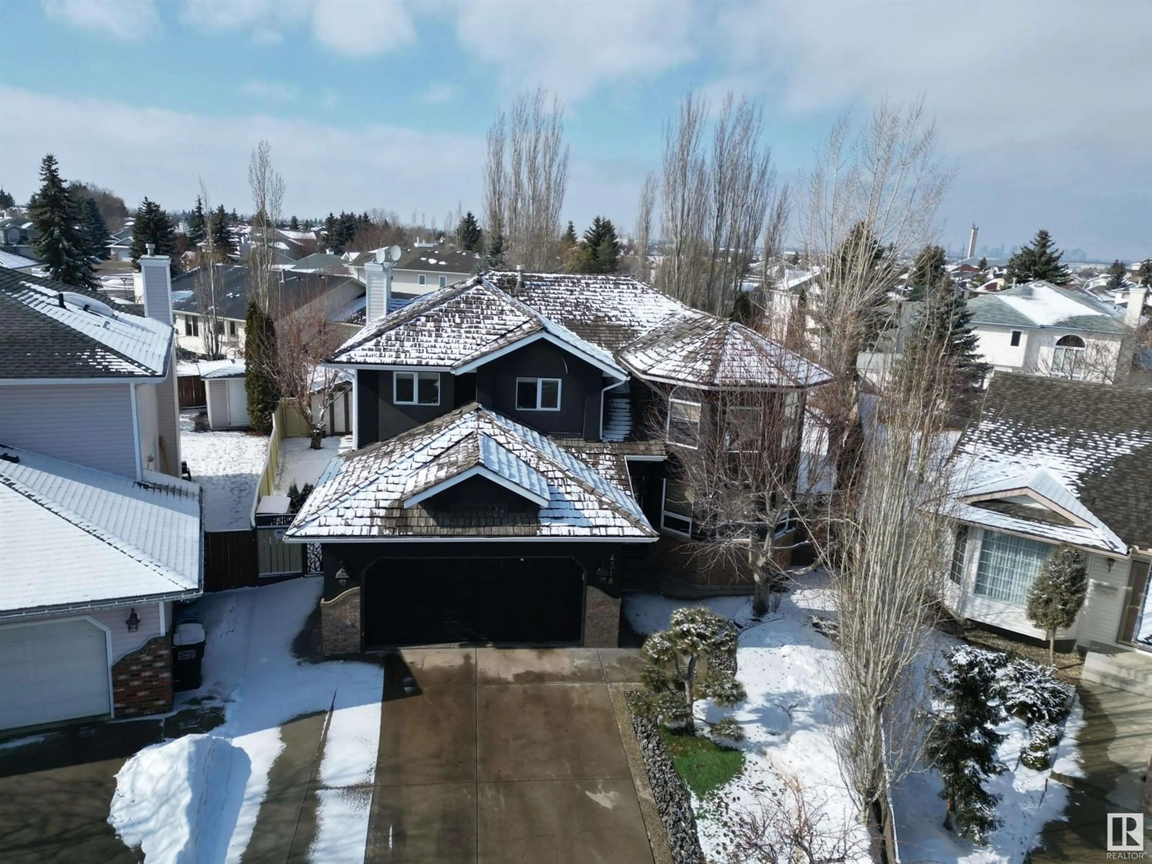 A pic from outside/outdoor area/front of a property/back of a property/a pic from drone, mountain view for NW - 4318 46 ST, Edmonton Alberta T6L6L9