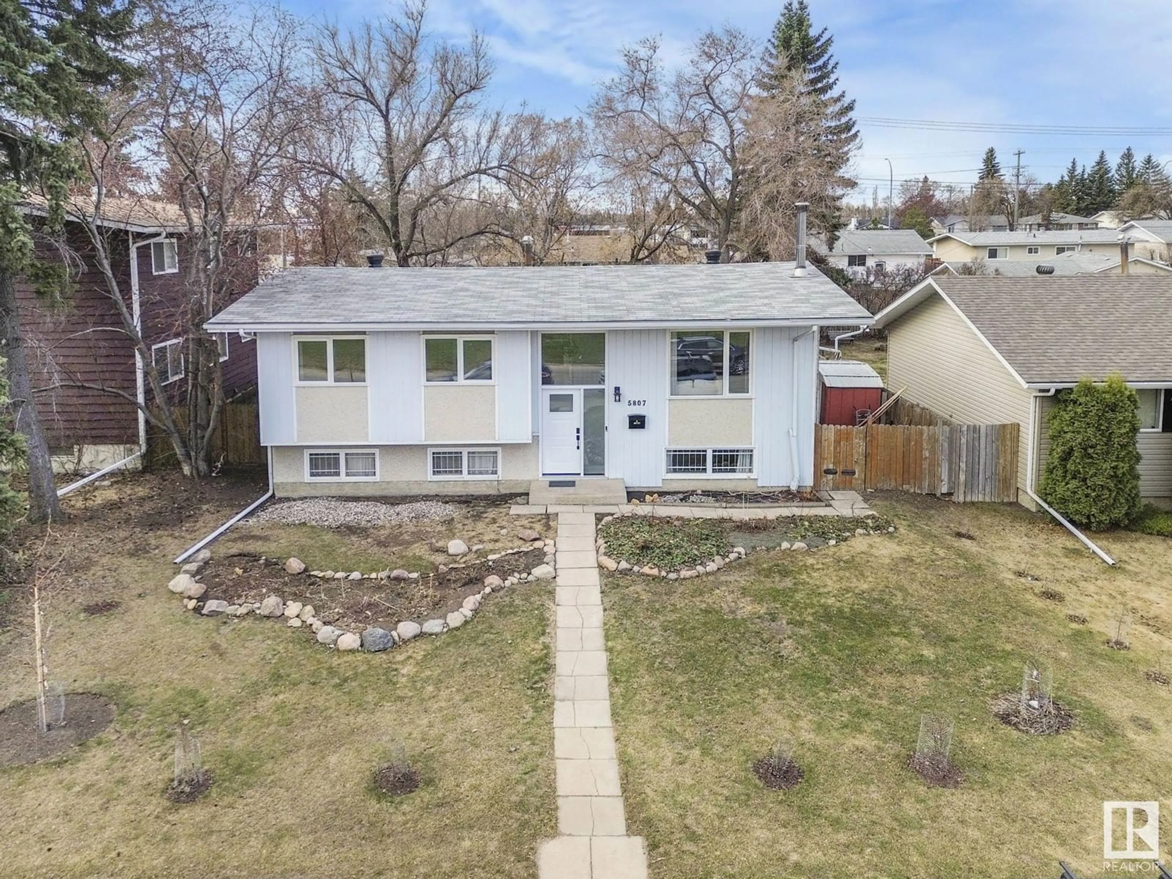 A pic from outside/outdoor area/front of a property/back of a property/a pic from drone, street for 5807 138 AV, Edmonton Alberta T5A1E4