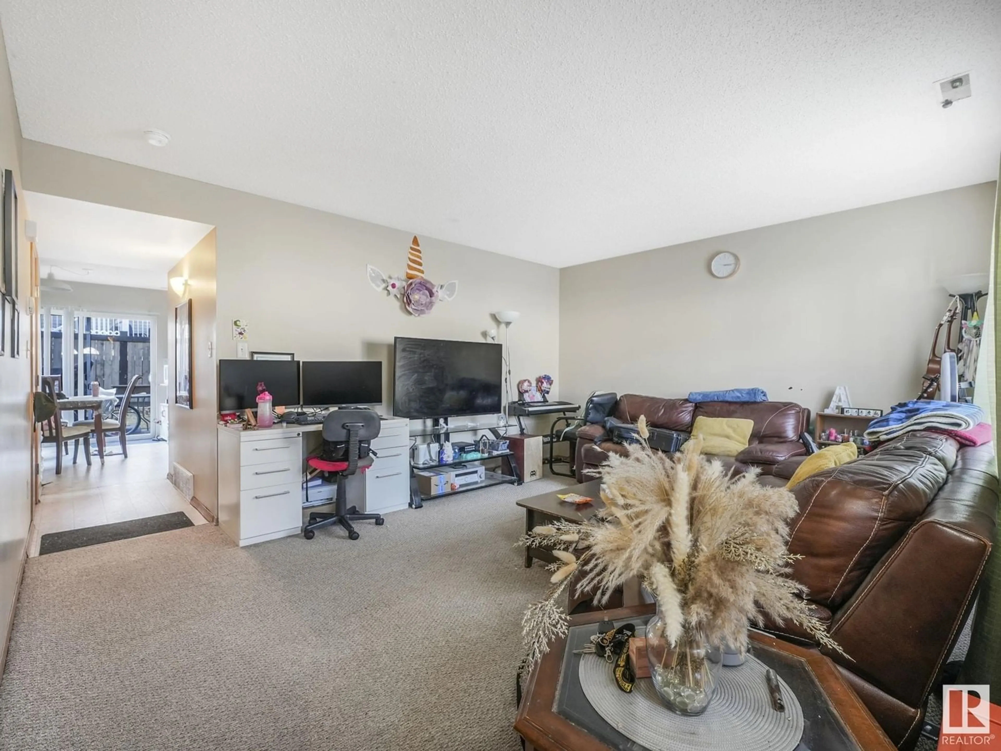 Living room with furniture, unknown for #109 - 180 BRIDGEPORT BV, Leduc Alberta T9E8S1