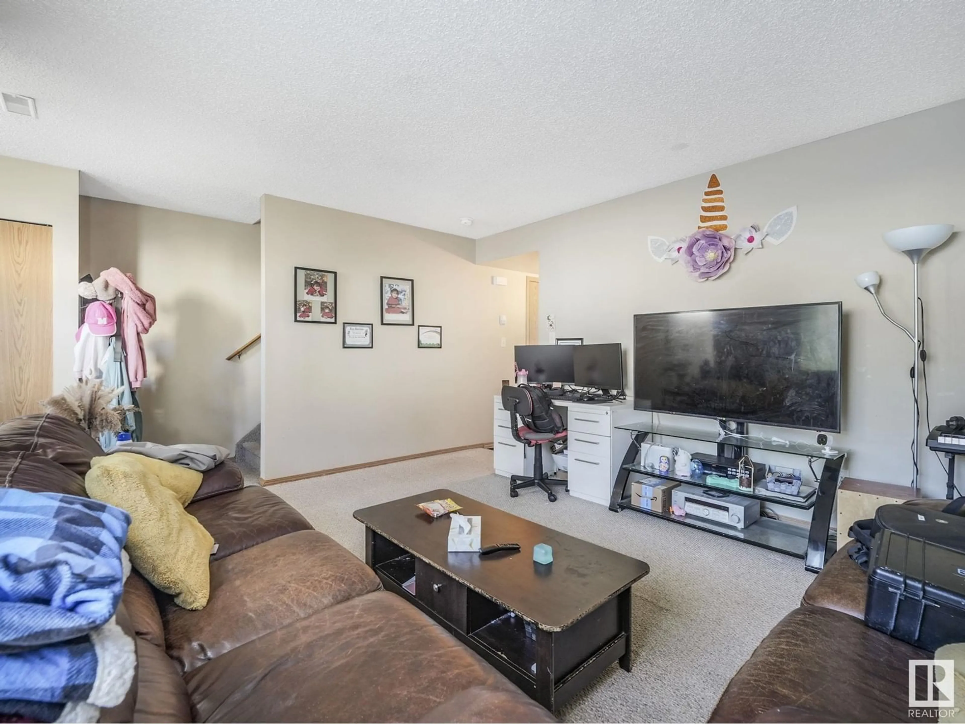 Living room with furniture, unknown for #109 - 180 BRIDGEPORT BV, Leduc Alberta T9E8S1