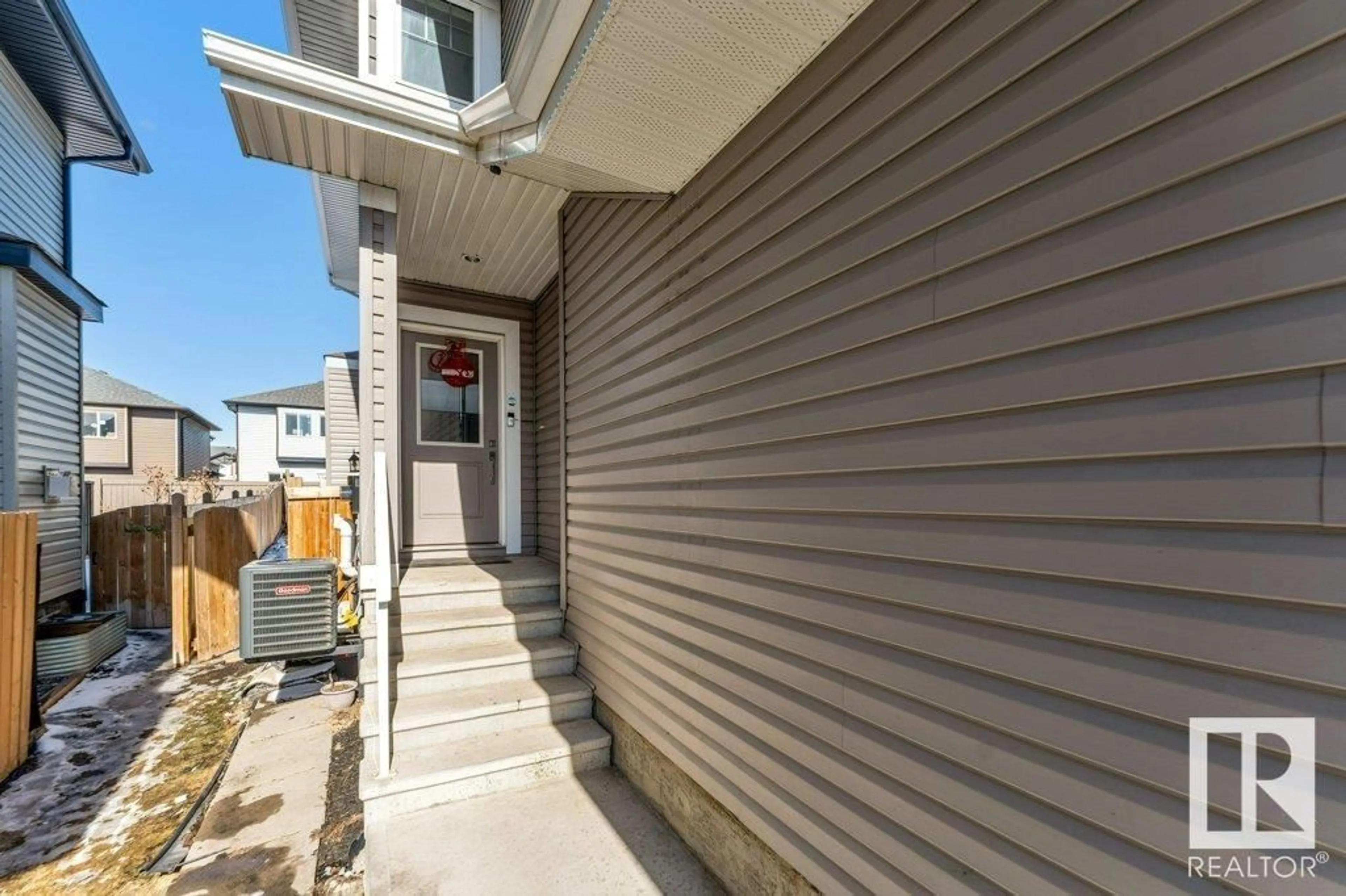 Home with vinyl exterior material, street for 1918 15 AV, Edmonton Alberta T6T2B6