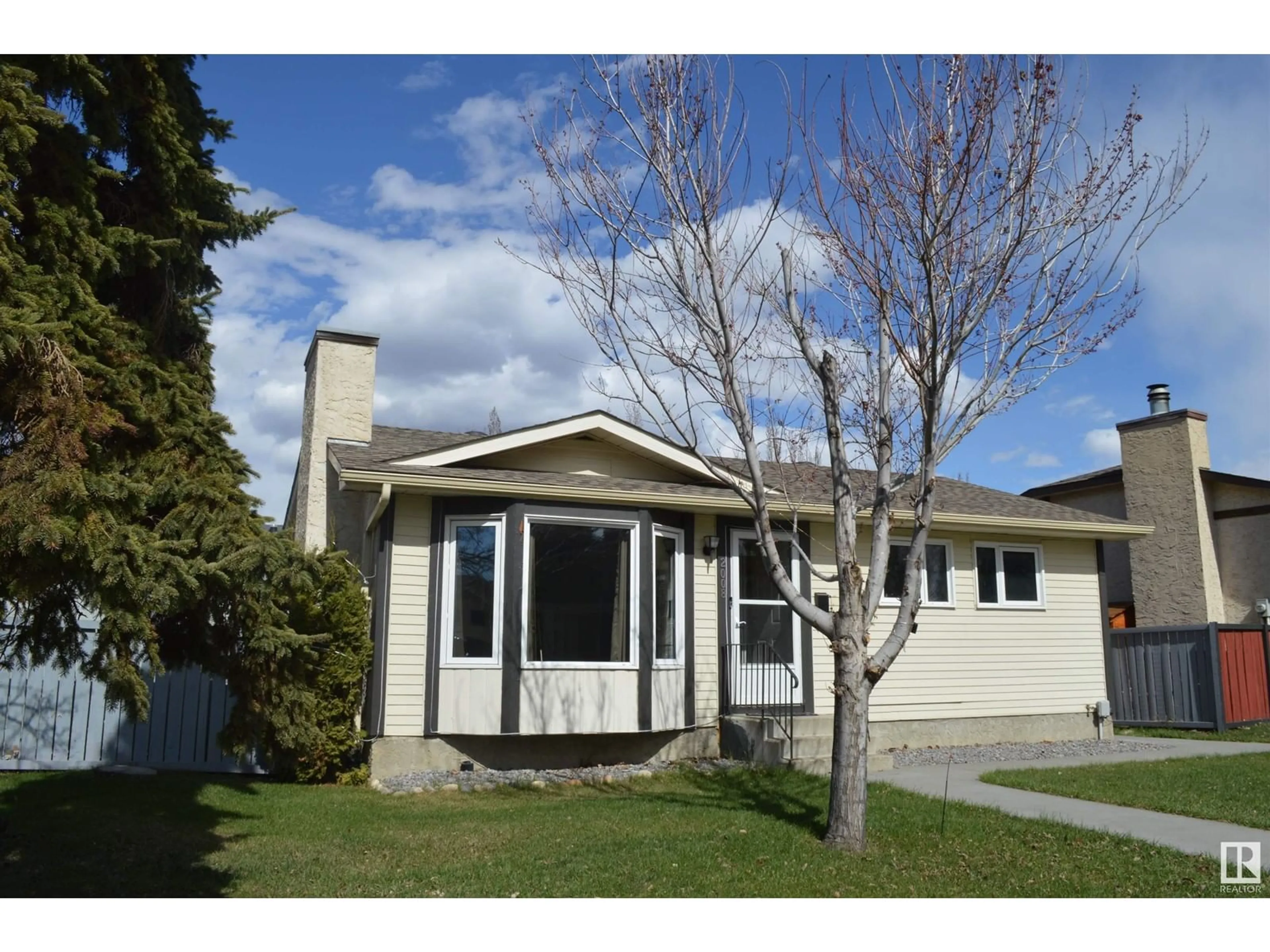 Home with vinyl exterior material, street for 2008 147 AV, Edmonton Alberta T5Y1T1