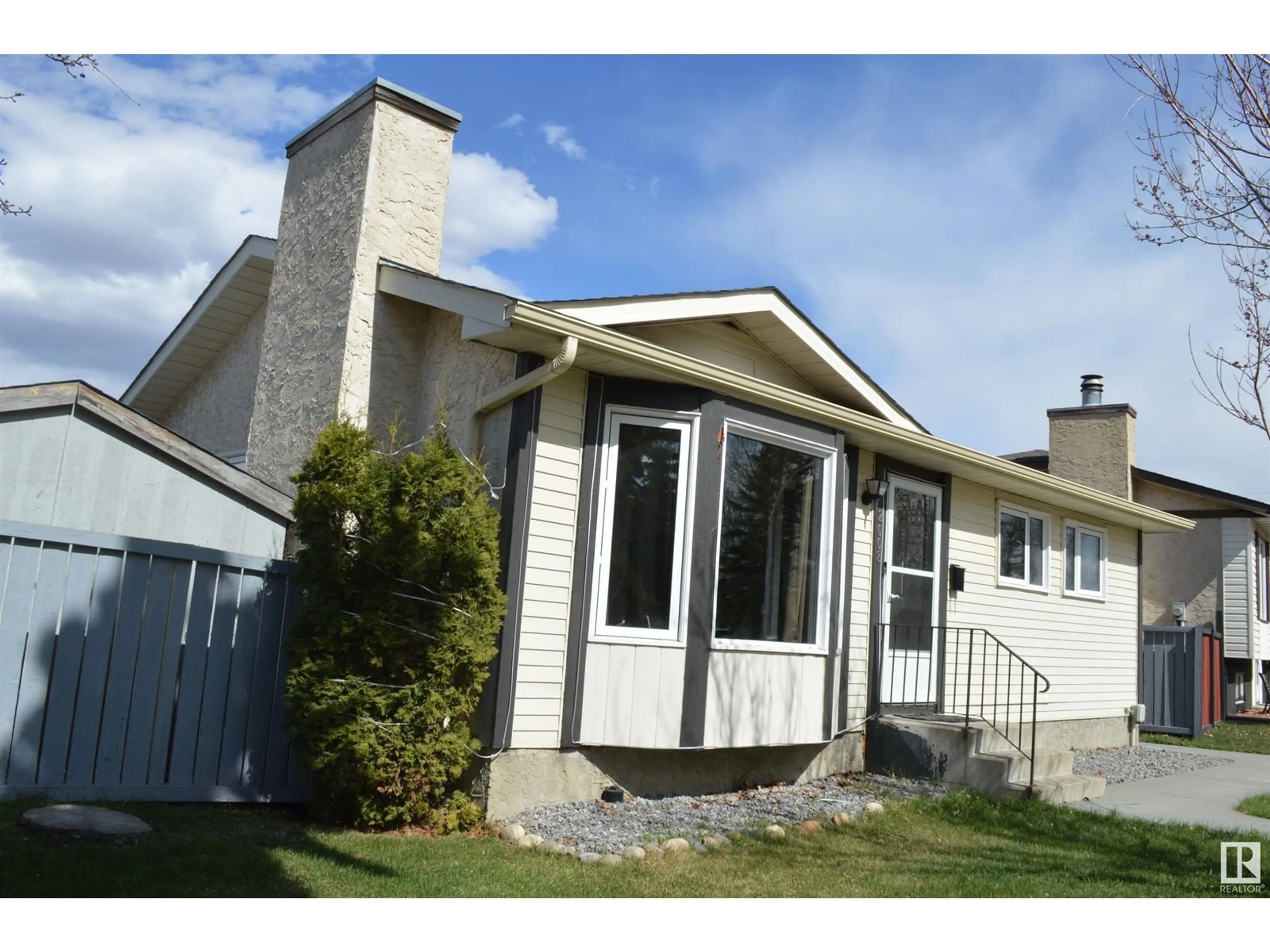 Home with vinyl exterior material, street for 2008 147 AV, Edmonton Alberta T5Y1T1