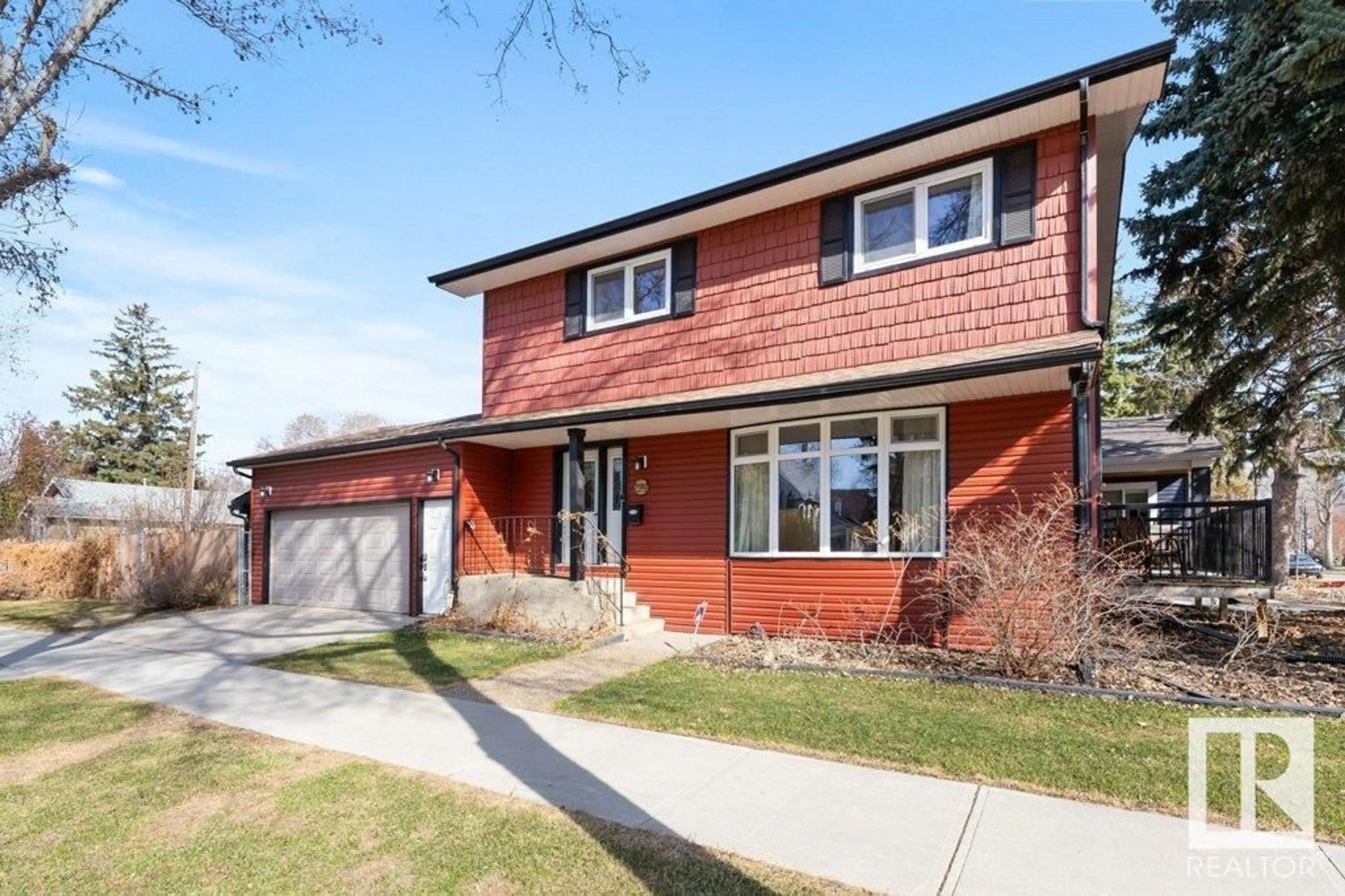 Home with brick exterior material, street for NW - 11002 122 ST, Edmonton Alberta T5M0B3