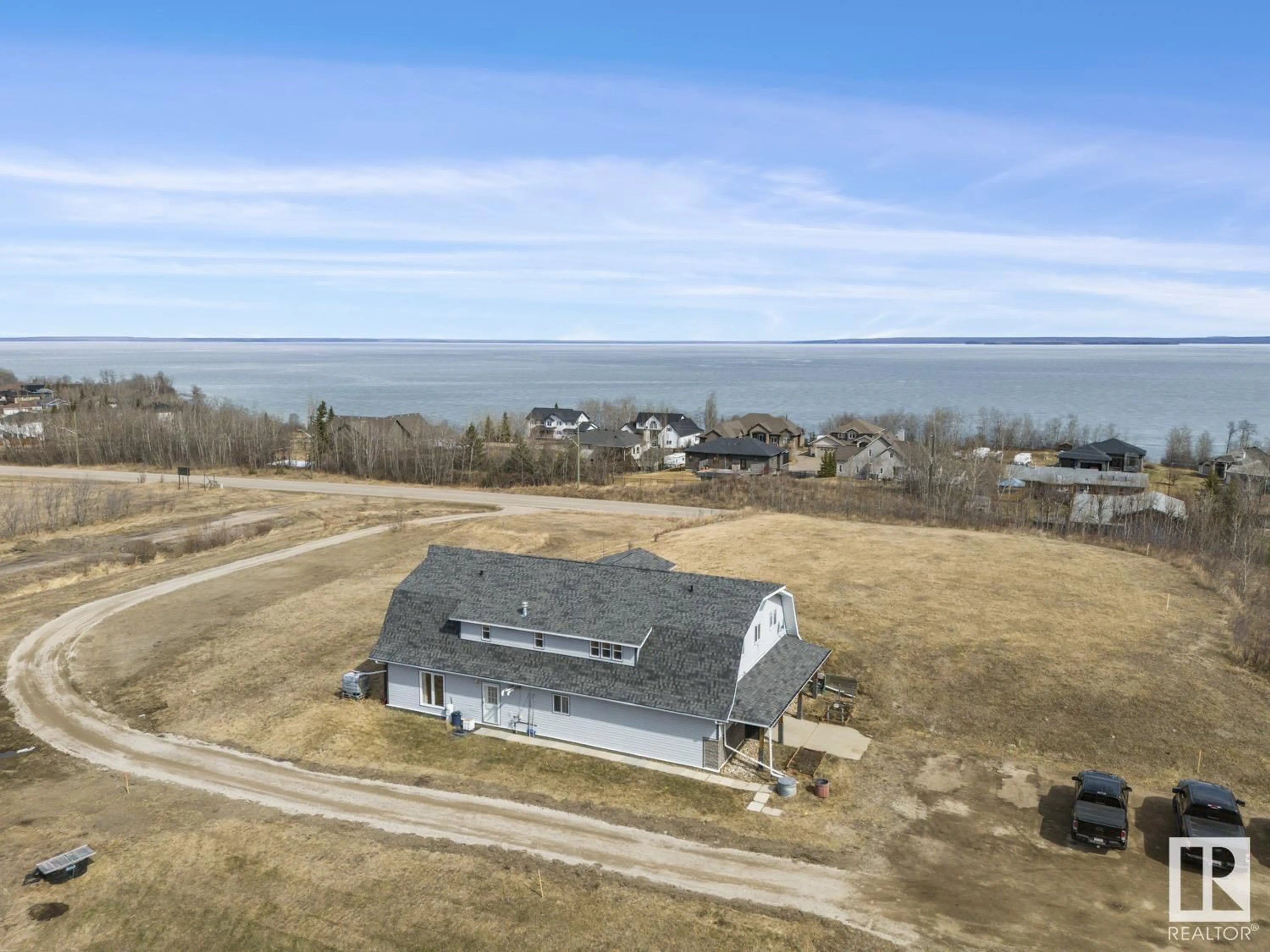 A pic from outside/outdoor area/front of a property/back of a property/a pic from drone, water/lake/river/ocean view for 1305 28 ST, Cold Lake Alberta T9M1G2